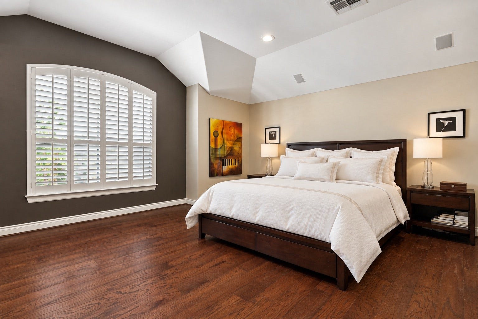 The primary is accessed through it's foyer that is flanked by it's spa like bath and a 2nd closet.  This bedroom is very large and offers a sitting area