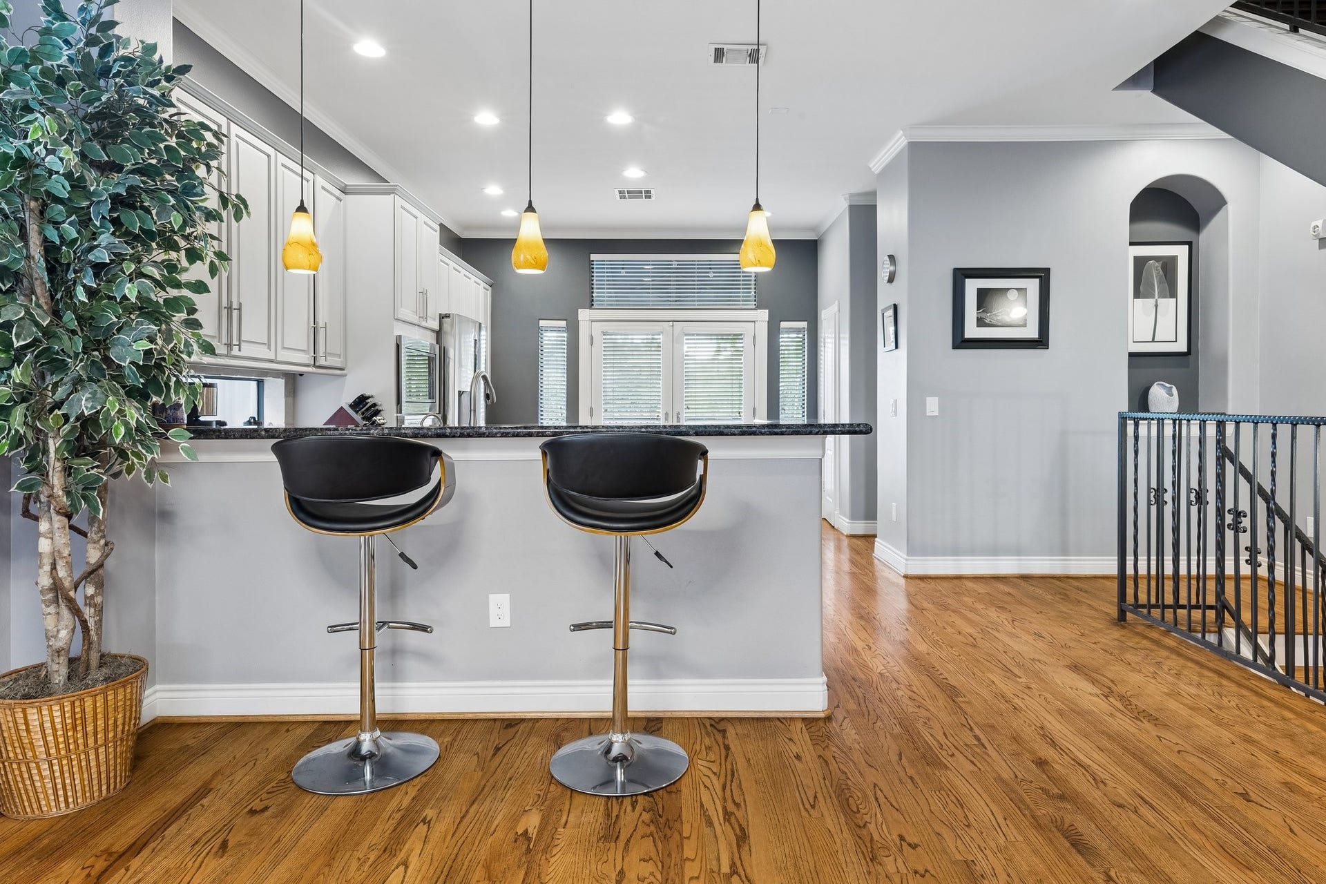 The breakfast bar backs to the large dining room