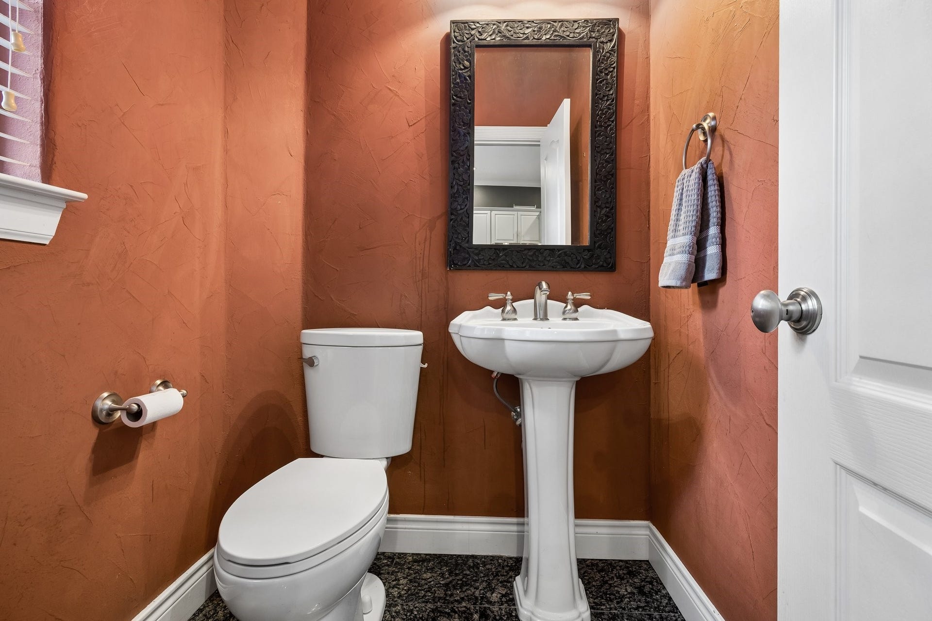 Powder room is located on the 2nd floor living area