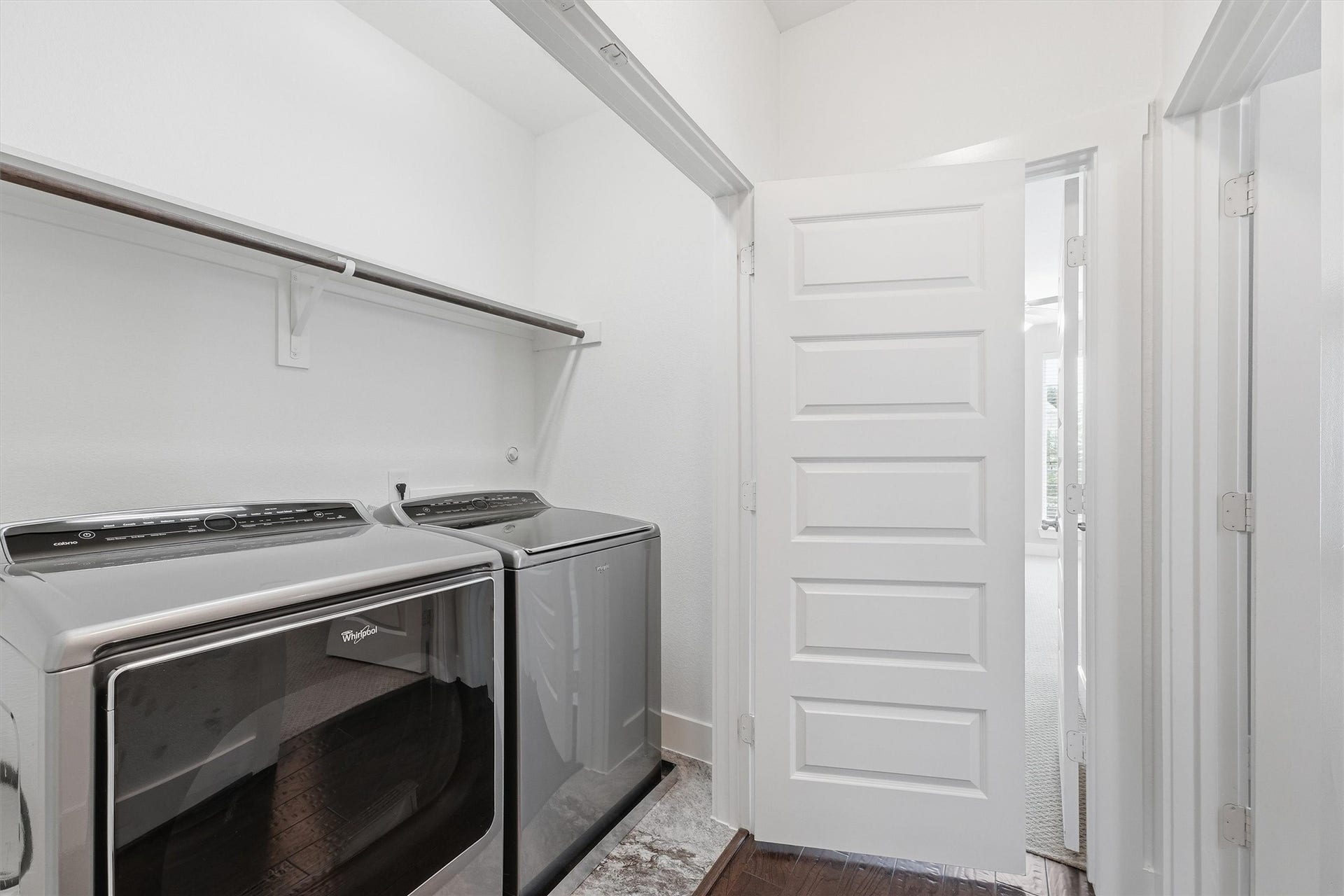 5326 Darling Street, Houston, TX 77007 Laundry closet, right outside the two secondary bedrooms.