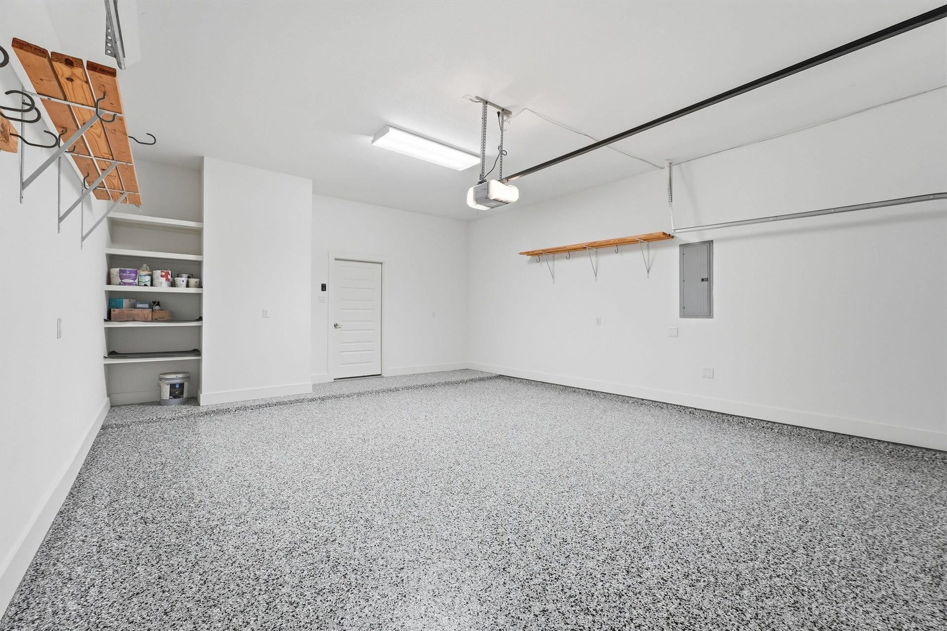 5326 Darling Street, Houston, TX 77007 Squeaky clean epoxied garage with storage hooks!