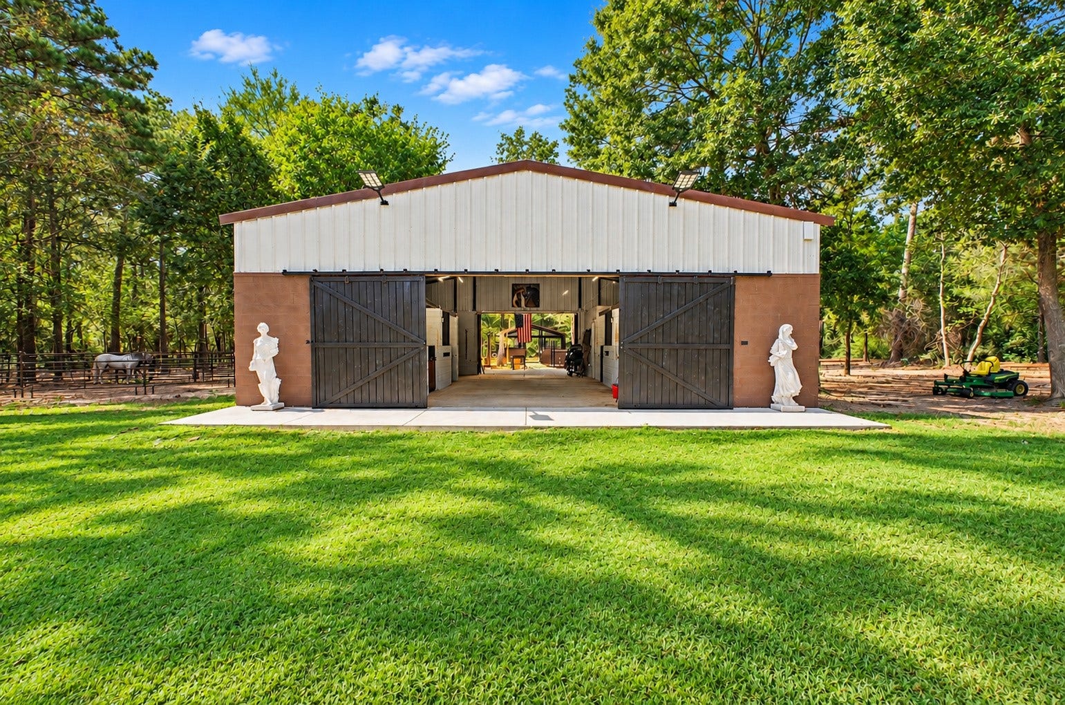 37753 Marias Way, Magnolia, TX 77354 A separate barn adds another dimension to the property, with dedicated space for horses and other animals surrounded by the wooded acreage.