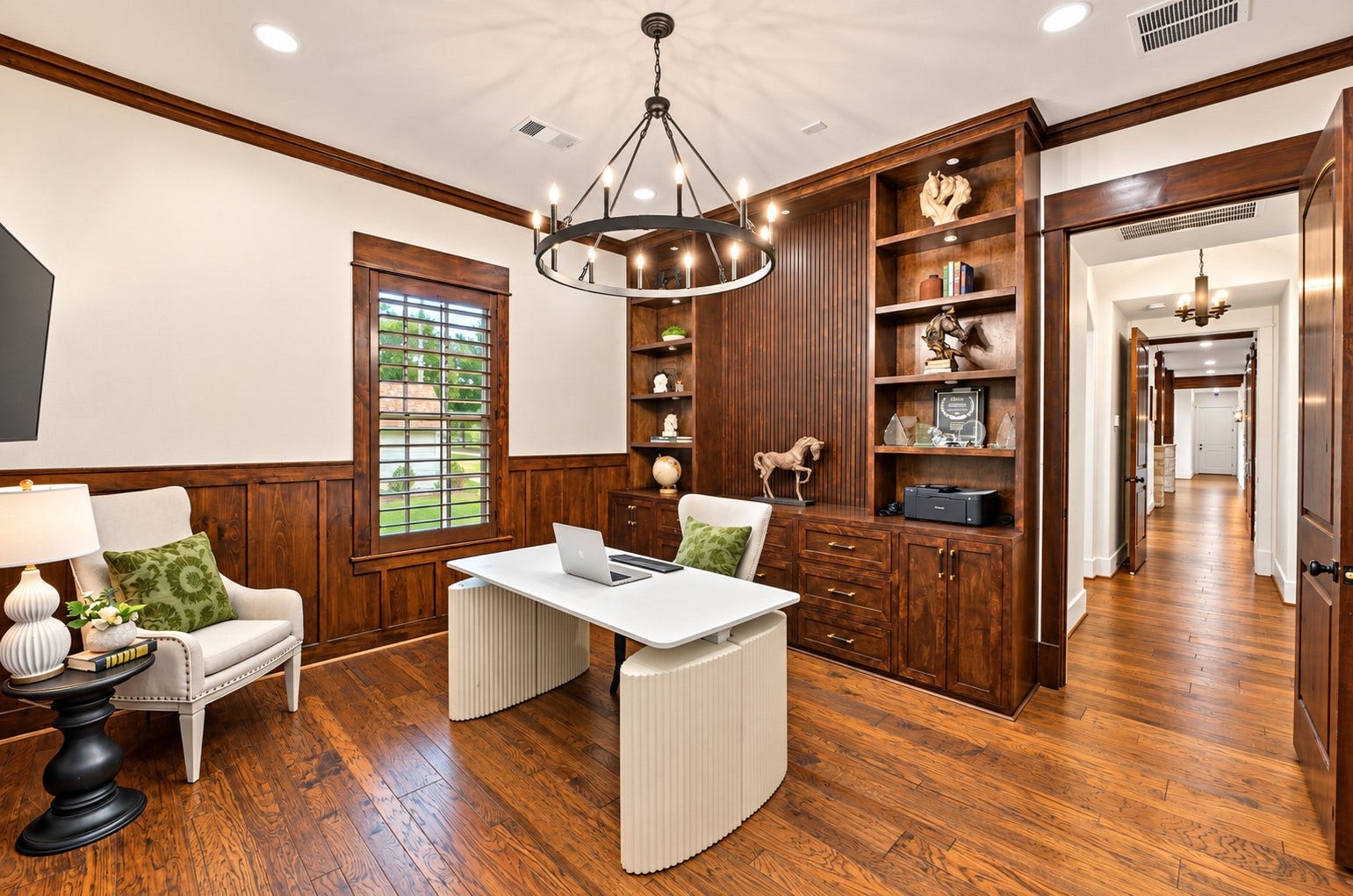 37753 Marias Way, Magnolia, TX 77354 A private study adjoining the primary suite offers a quiet, dedicated workspace with extensive built-ins, a large desk area and warm hardwood floors.