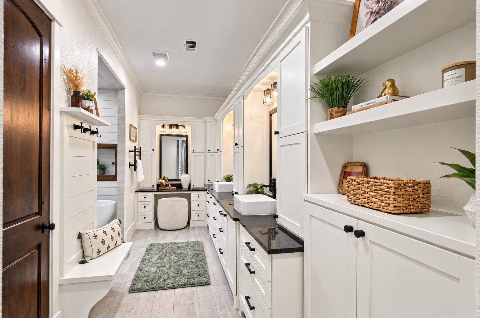 37753 Marias Way, Magnolia, TX 77354 The spacious primary bath features separate vanities with abundant cabinetry and storage, offering plenty of room for everyday routines.