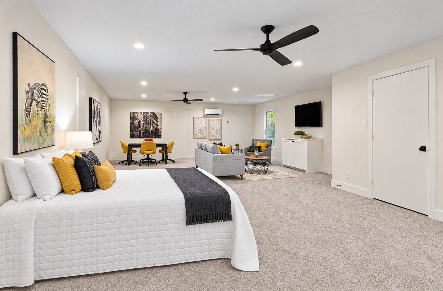 37753 Marias Way, Magnolia, TX 77354 Upstairs in the metal building, the expansive bunk room offers plenty of space to accommodate multiple overnight guests, with an attached full bath and flexibility for recreation or additional living space.