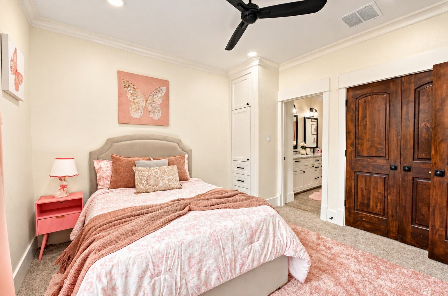 37753 Marias Way, Magnolia, TX 77354 The adjoining upstairs bedroom continues the comfortable accommodations with generous space, natural light and access to the shared dual-sink bath.