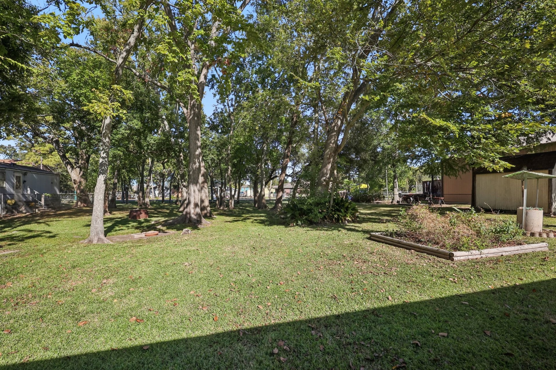 4733 Oleander Street, Bacliff, TX 77518 The back yard is massive and extends to the street behind the home. Dozens of mature trees provide ample shade year round.