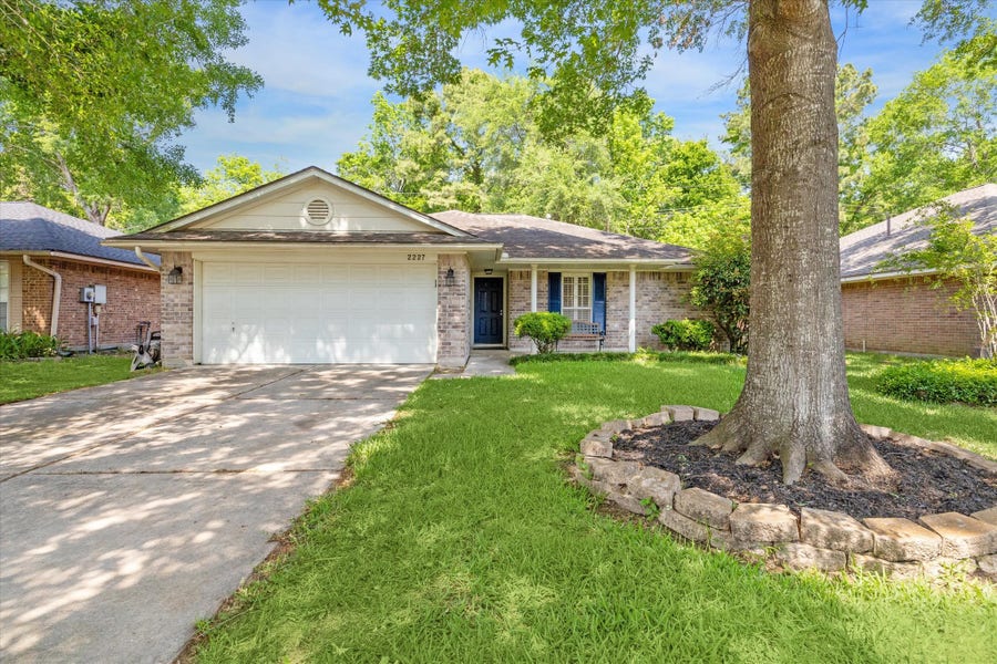 Property photo for 2227 Friarwood Trail, Kingwood, TX