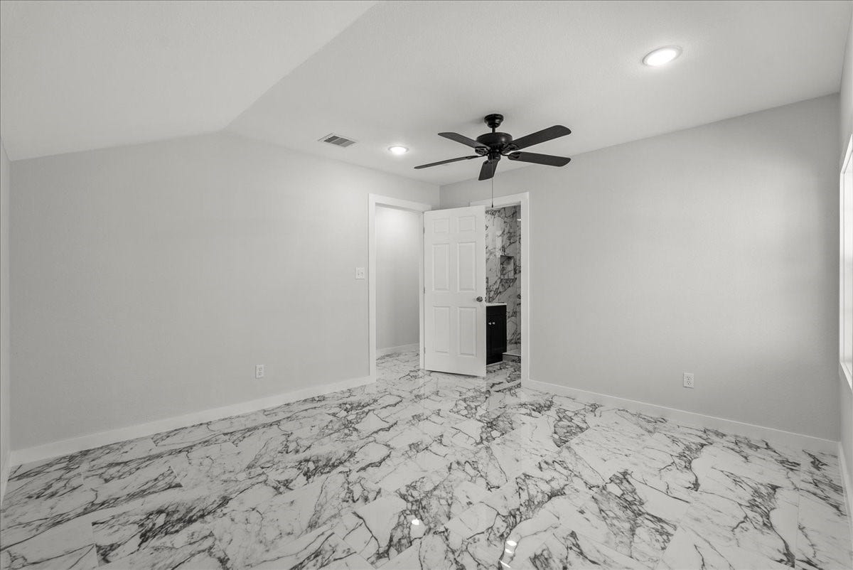 1105 W Ellaine Avenue, Pasadena, TX 77506 Comfortable secondary bedroom with large window and closet space.