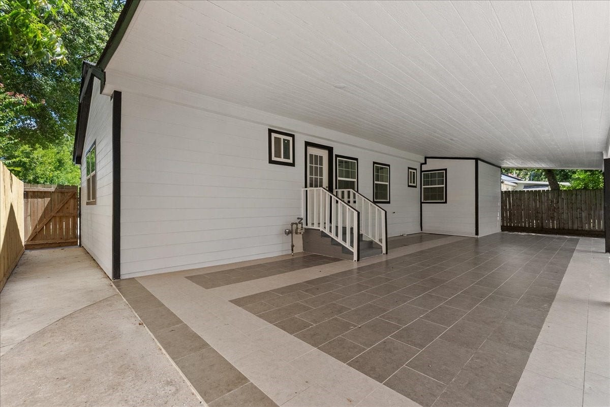 1105 W Ellaine Avenue, Pasadena, TX 77506 Expansive covered patio perfect for outdoor entertaining year-round.