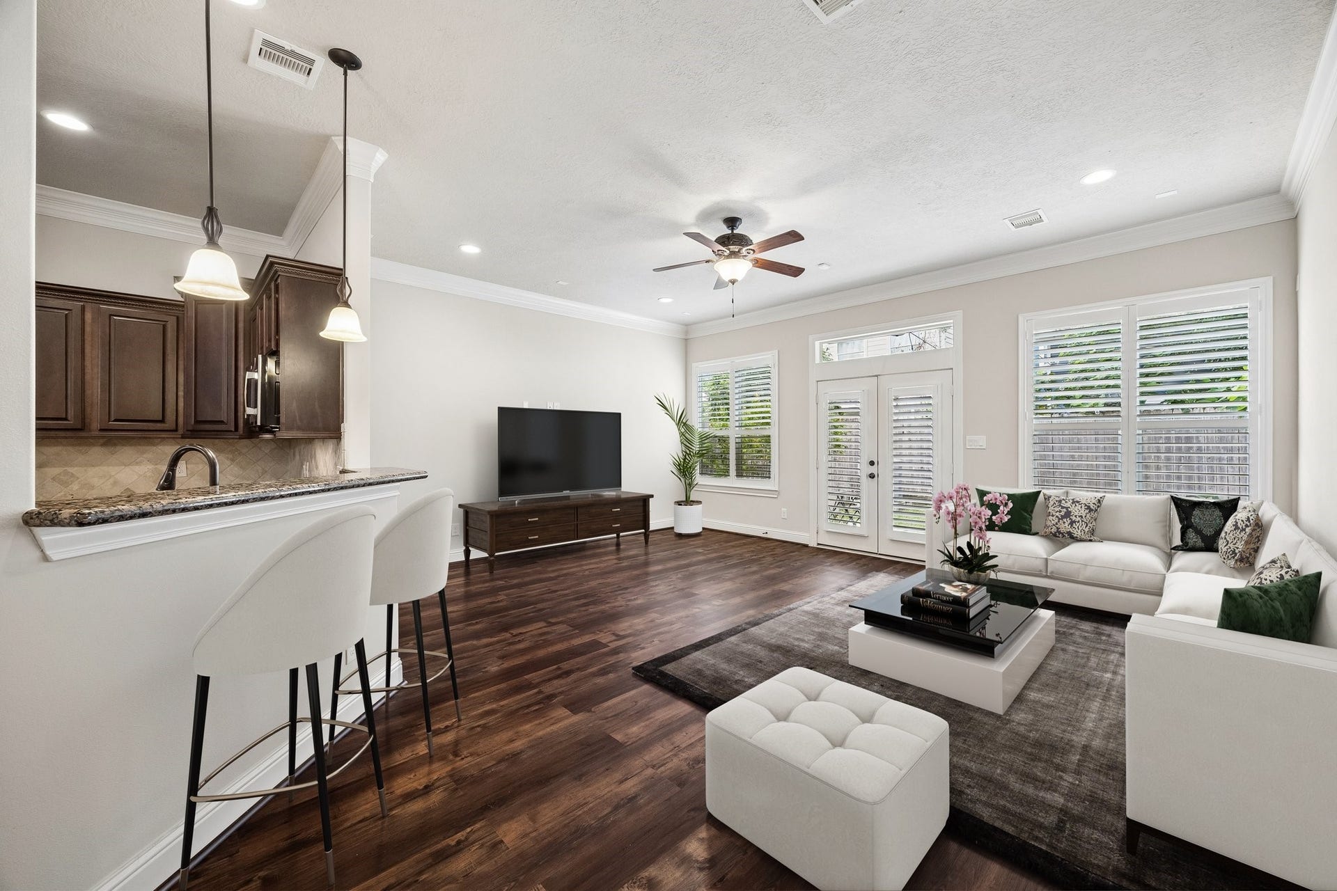 5513 Petty Street, #C, Houston, TX 77007 Open living and dining area with natural light and backyard views.