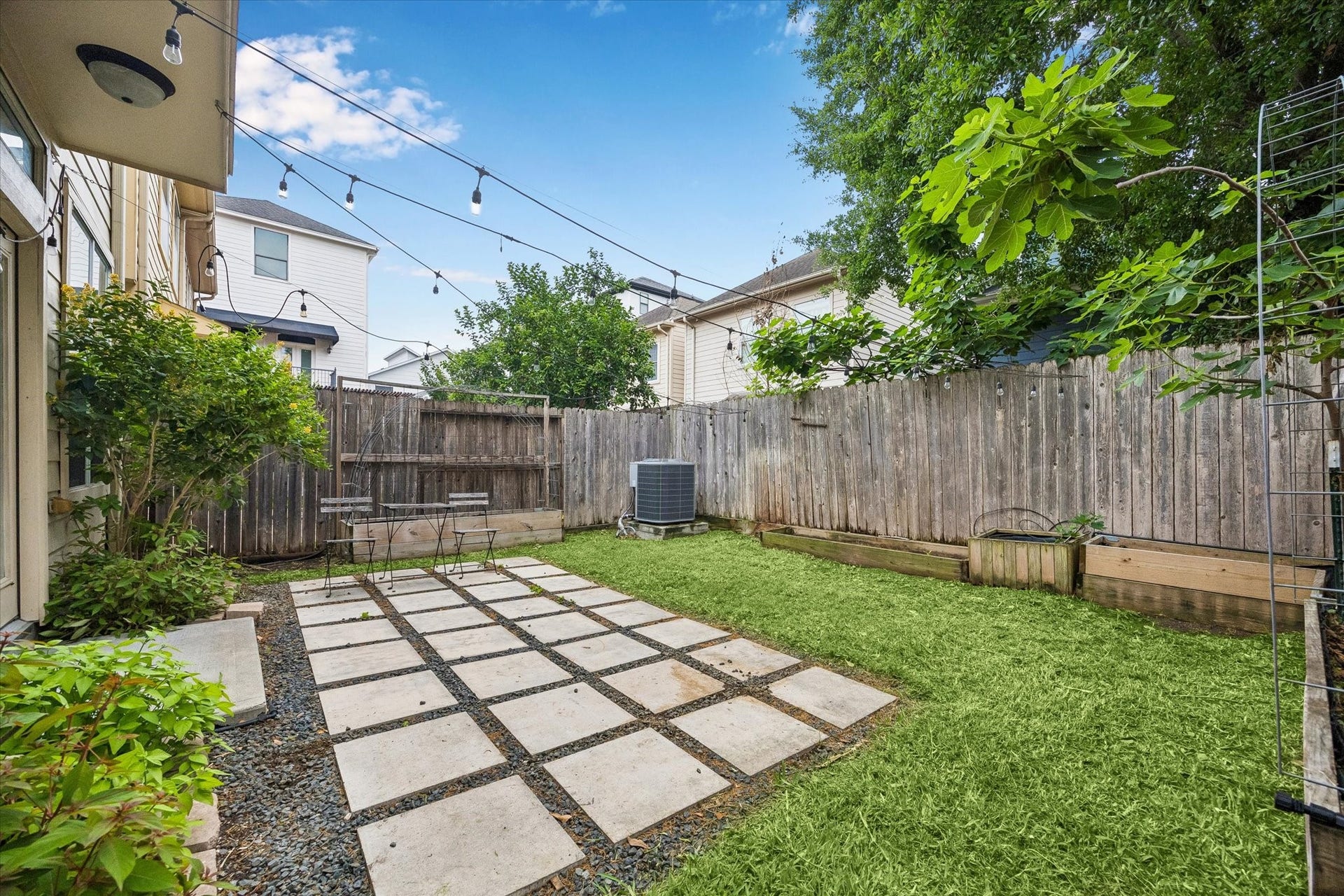 5513 Petty Street, #C, Houston, TX 77007 Private backyard with patio, green space, and room to entertain outdoors.