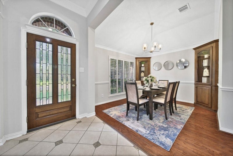 4911 Big Elm Circle, Missouri City, TX 77459 The view front front foyer to formal dining W/Built-in China cabinets.
