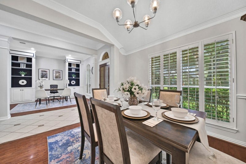 4911 Big Elm Circle, Missouri City, TX 77459 The other view of formal dining W/Plantation shutters.