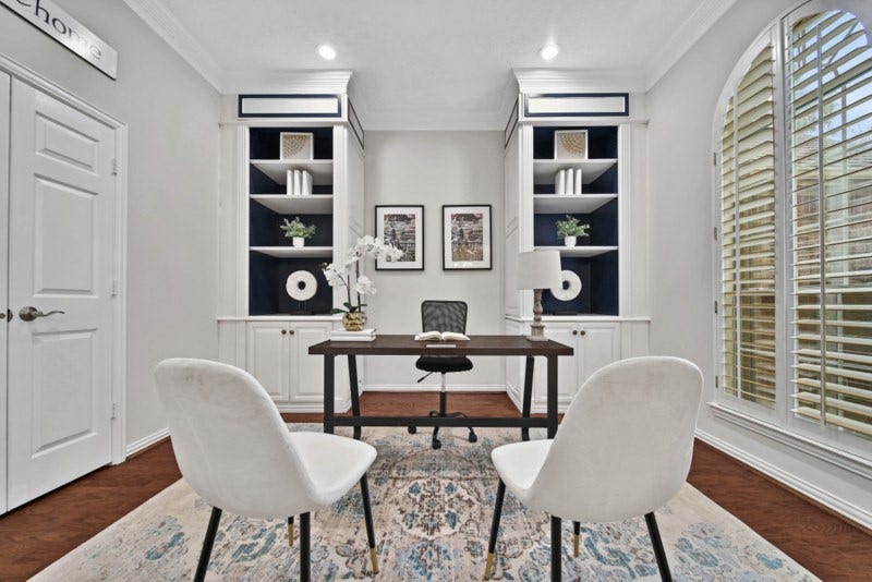 4911 Big Elm Circle, Missouri City, TX 77459 The view of home office/study W/Built-in bookshelves, plantation shutters.