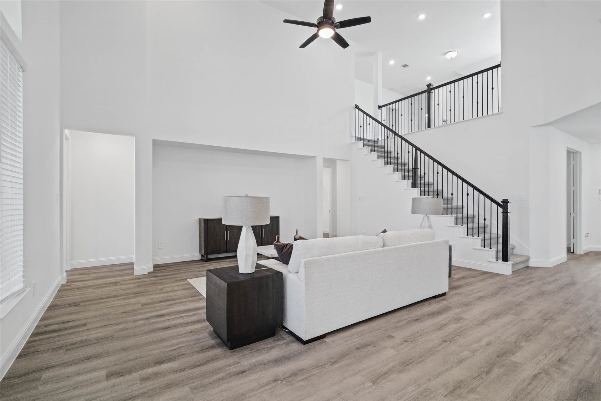 Whether you are relaxing in the great room or greeting guests at the front door, the open sightlines ensure that everyone feels connected, fostering a truly inclusive living experience where isolation is a thing of the past.