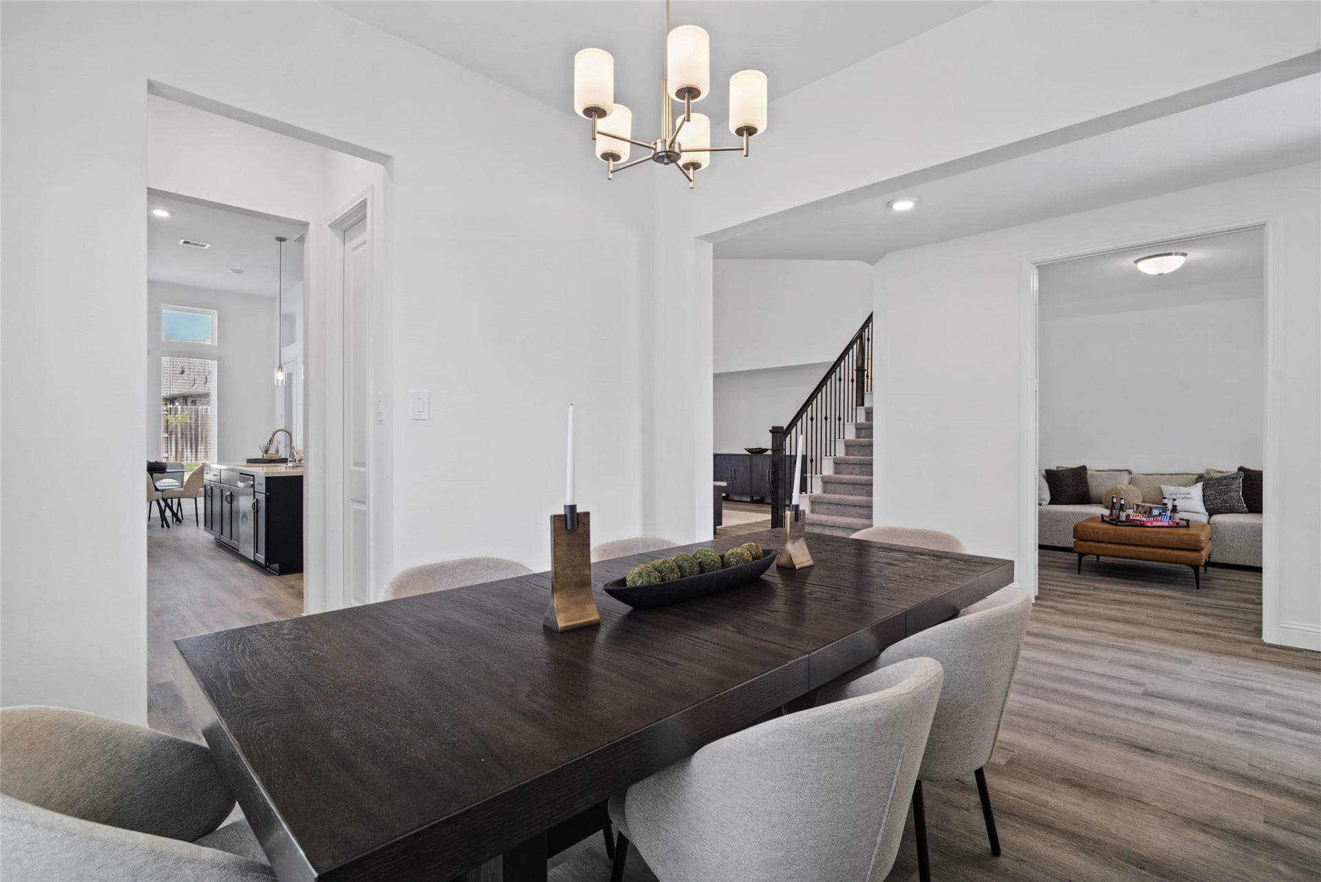 Additional view from the formal dining showcasing easy entry into the butler's pantry and kitchen.
