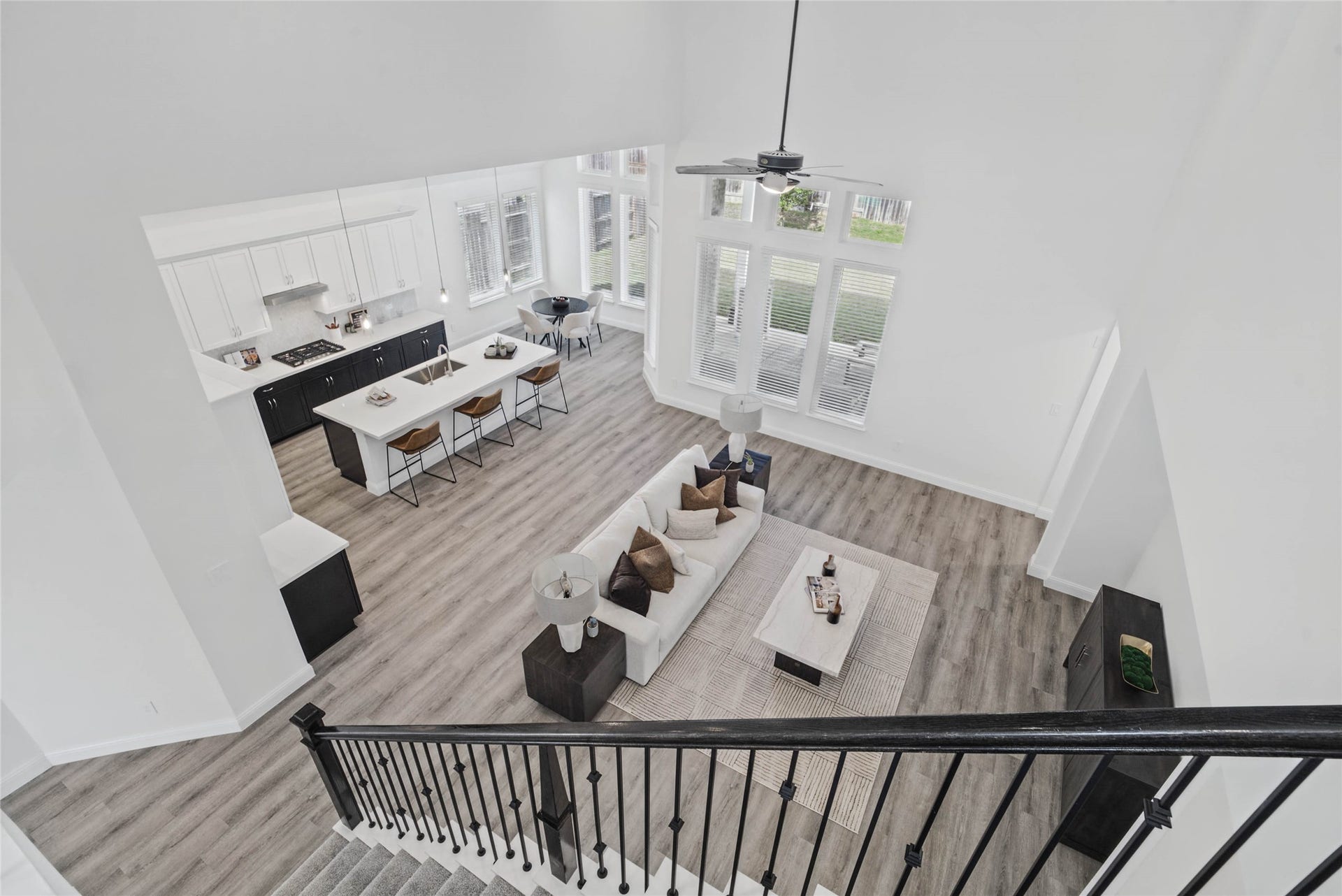 A phenomenal view from the second story, capturing the seamless flow between levels and an abundance of natural light.