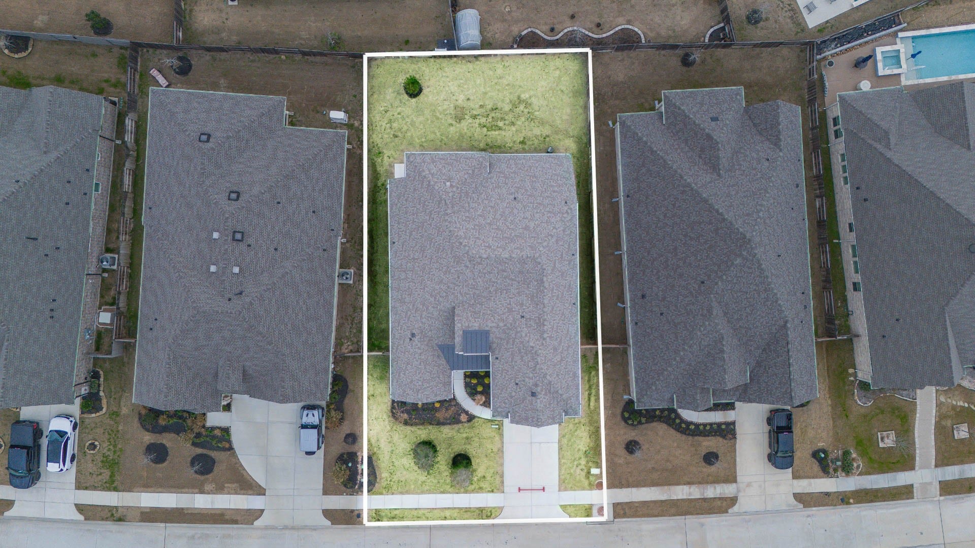 This home sits on a large lot with ample yard space in front and the back, lush landscaping and well-maintained yard!