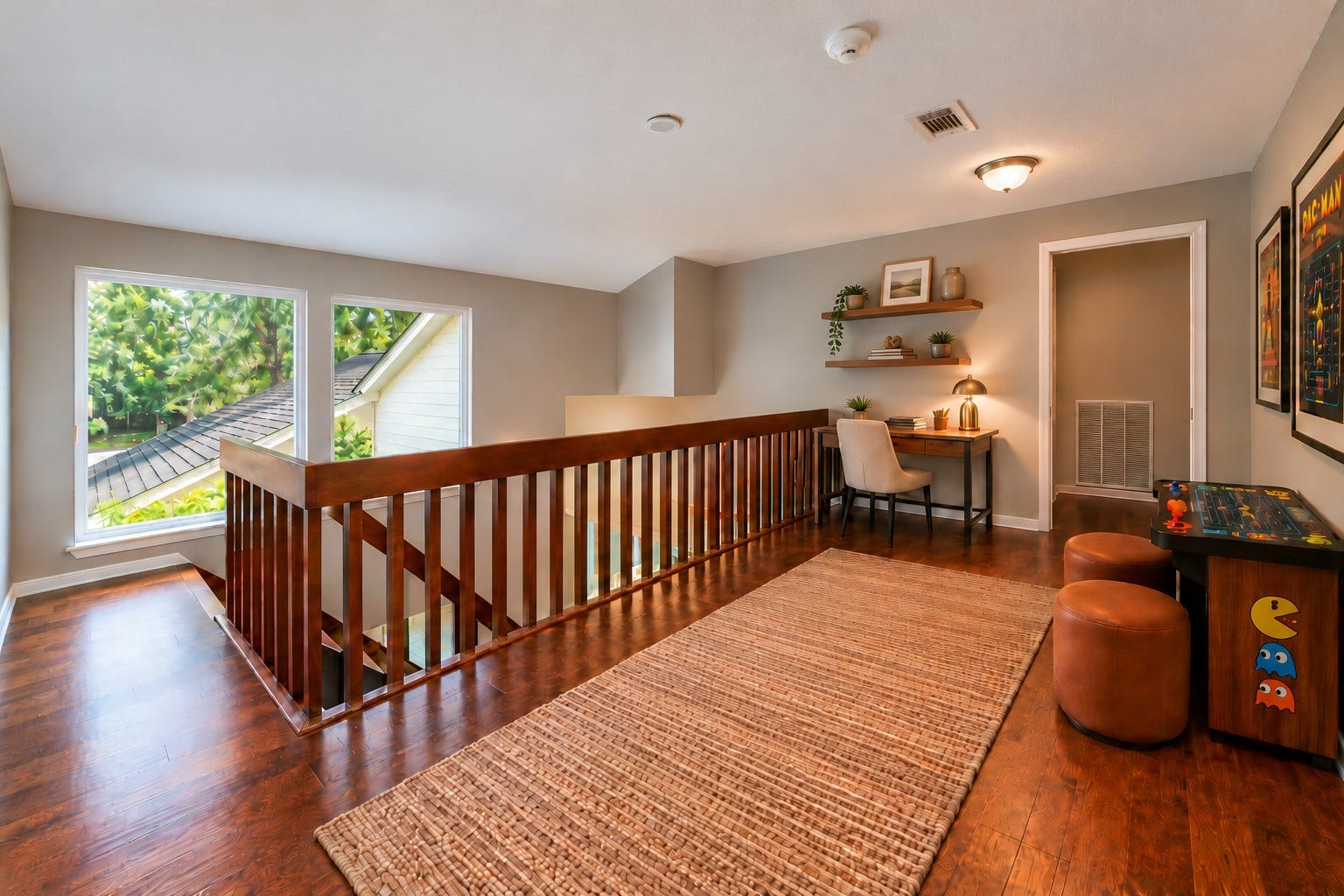 13007 New Cypress Drive, Cypress, TX 77429 More than just a landing! This spacious upstairs loft area offers room for a homework station, gaming nook, or cozy reading retreat. Large windows bring in natural light, while beautiful wood floors and an open staircase connect the home's two levels.