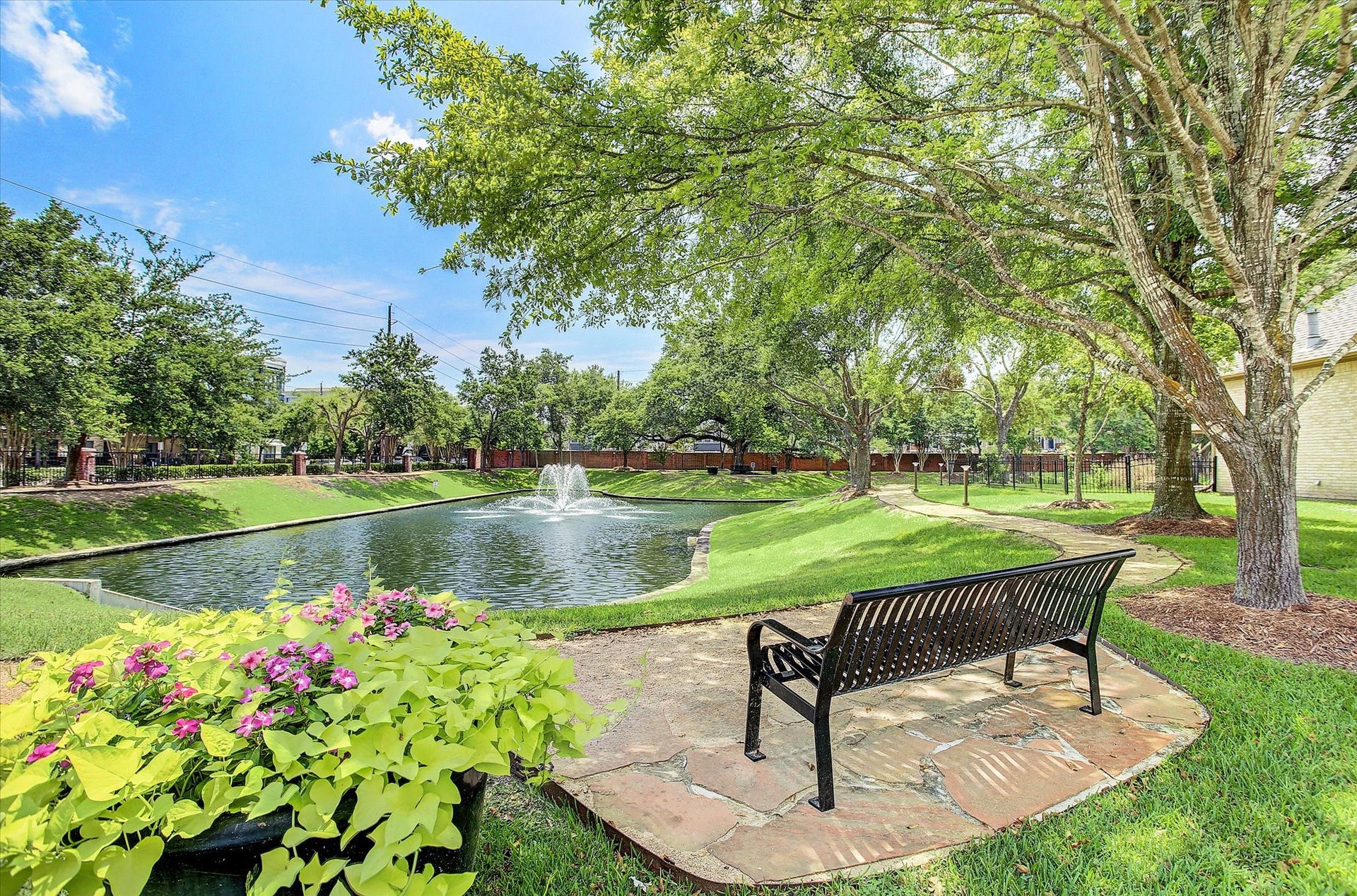 1502 Lakeside Enclave Drive, Houston, TX 77077 A relaxing view of the lake and fountain as you enter the community.