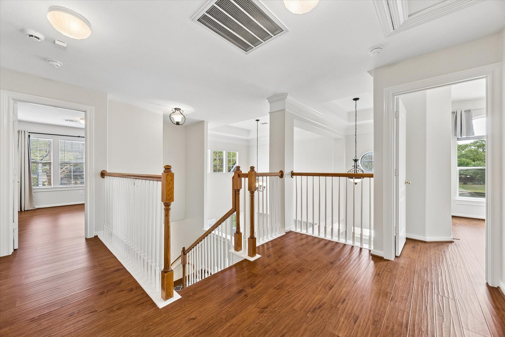 1502 Lakeside Enclave Drive, Houston, TX 77077 Upstairs Landing showing a bedroom on the right and left.