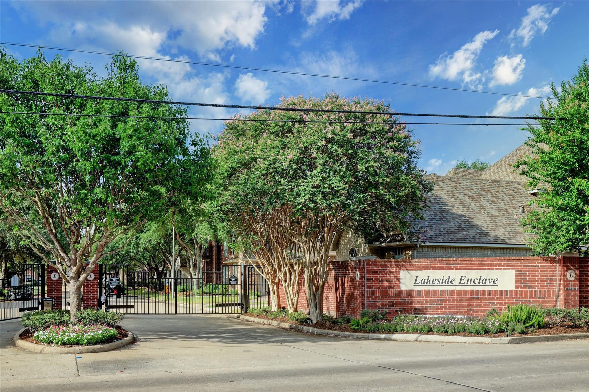 1502 Lakeside Enclave Drive, Houston, TX 77077 The gated entry to Lakeside Enclave.