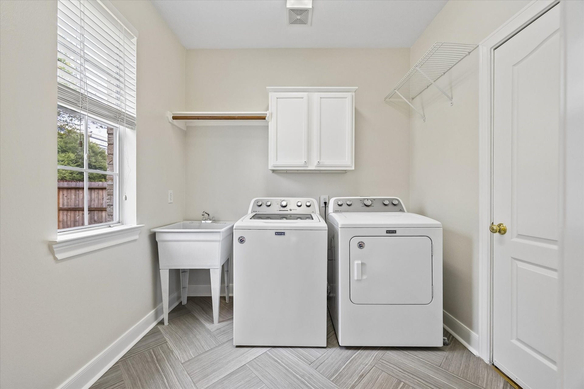 1502 Lakeside Enclave Drive, Houston, TX 77077 Laundry Room on the first floor. Washer/ Dryer remain with the home.