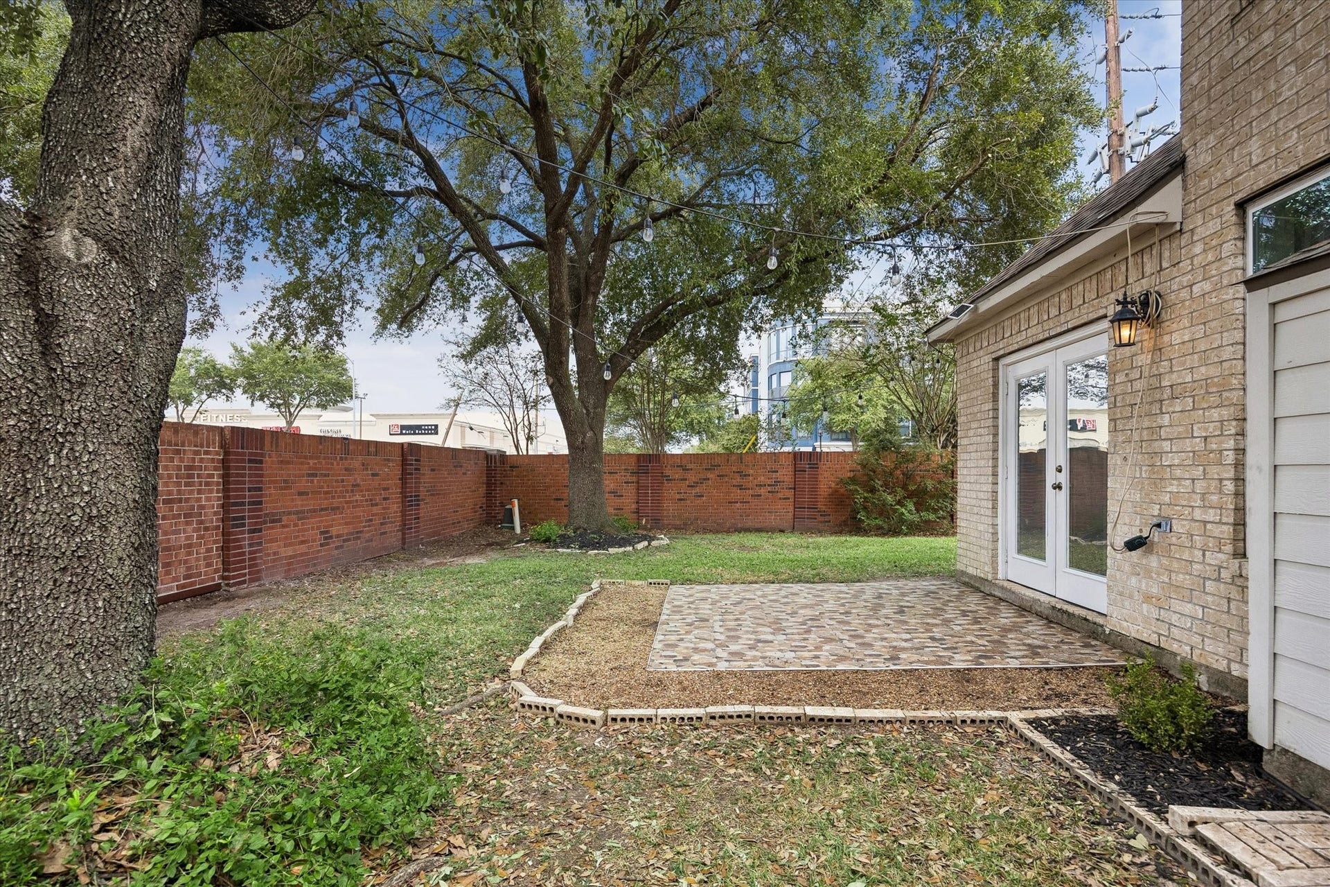 1502 Lakeside Enclave Drive, Houston, TX 77077 The patio area is off of the breakfast room/ kitchen.