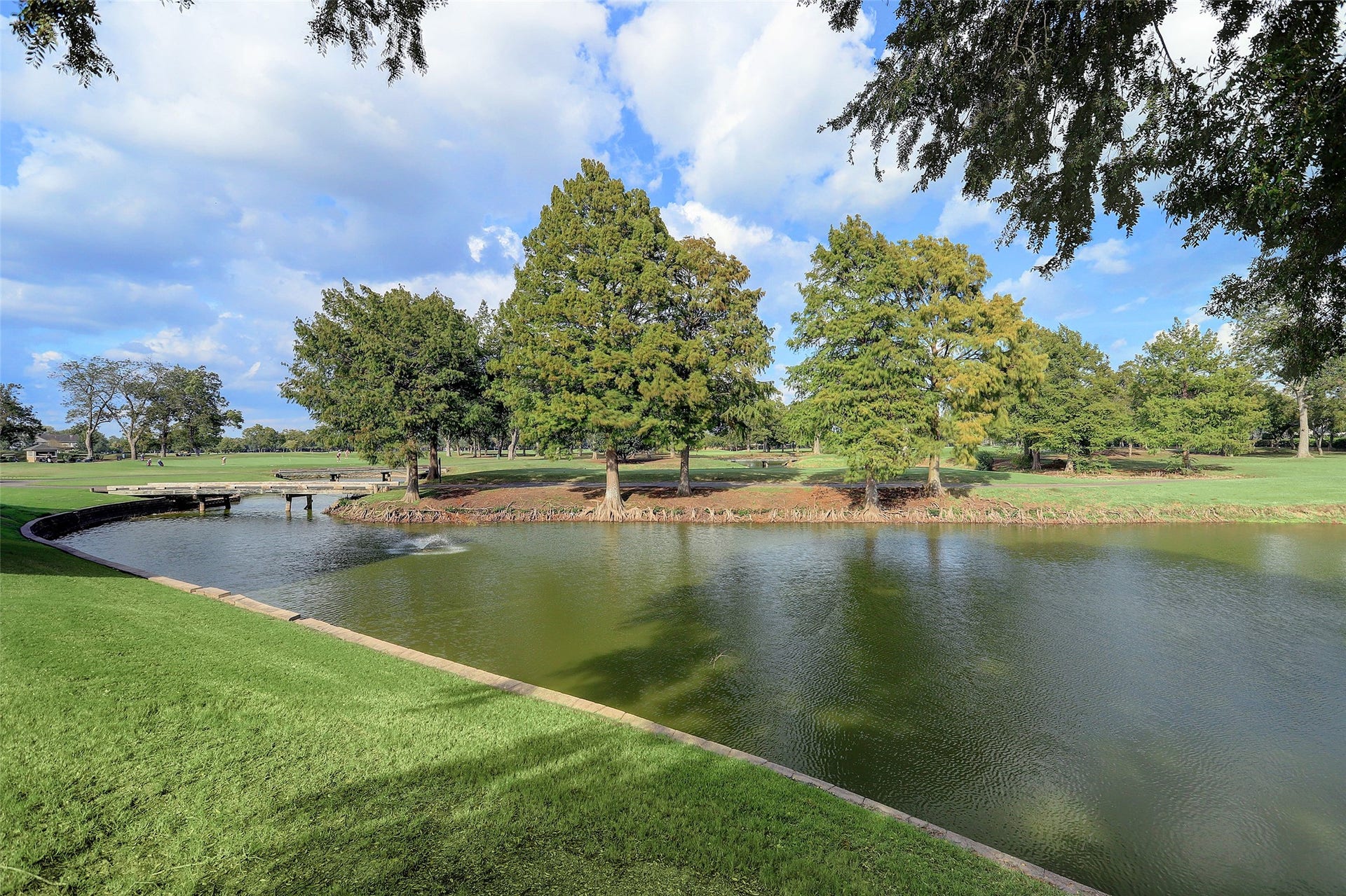 93 Greensward Lane, Sugar Land, TX 77479 Scenic lakes and landscaped green spaces are woven throughout Sweetwaters golf course community. The neighborhood offers a blend of natural surroundings, walking areas, and country club living in the heart of Sugar Land. Nearby TPC golf courses and recreational amenities contribute to the community lifestyle.