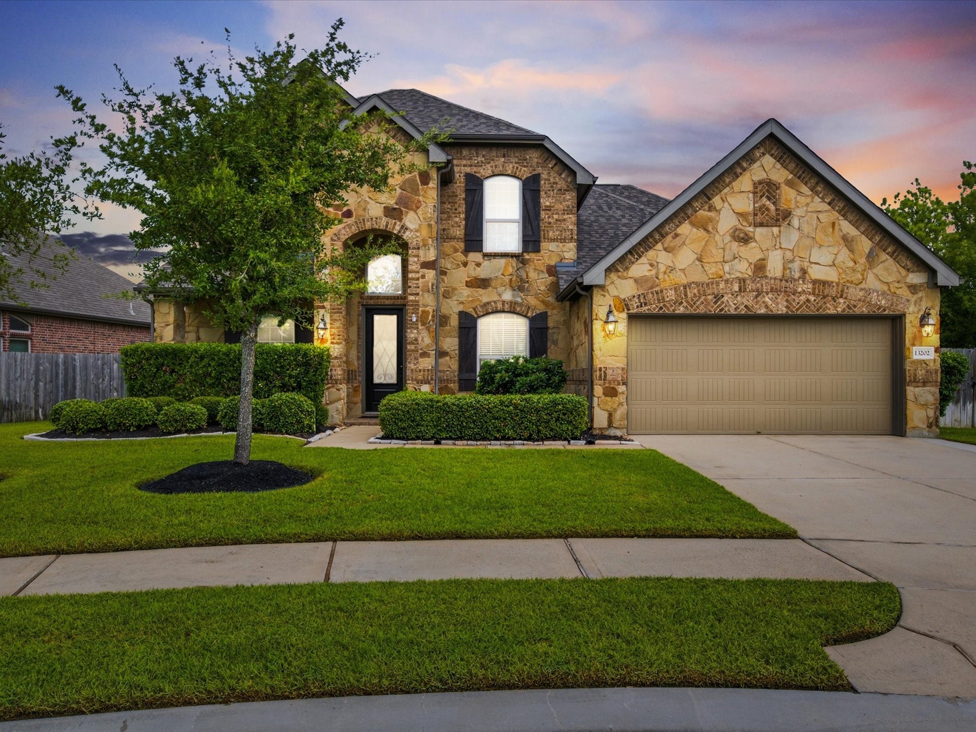 Beautiful curb appeal welcomes you to this exceptional Wildwood at Northpointe home, perfectly positioned on an oversized lot with timeless architectural details.