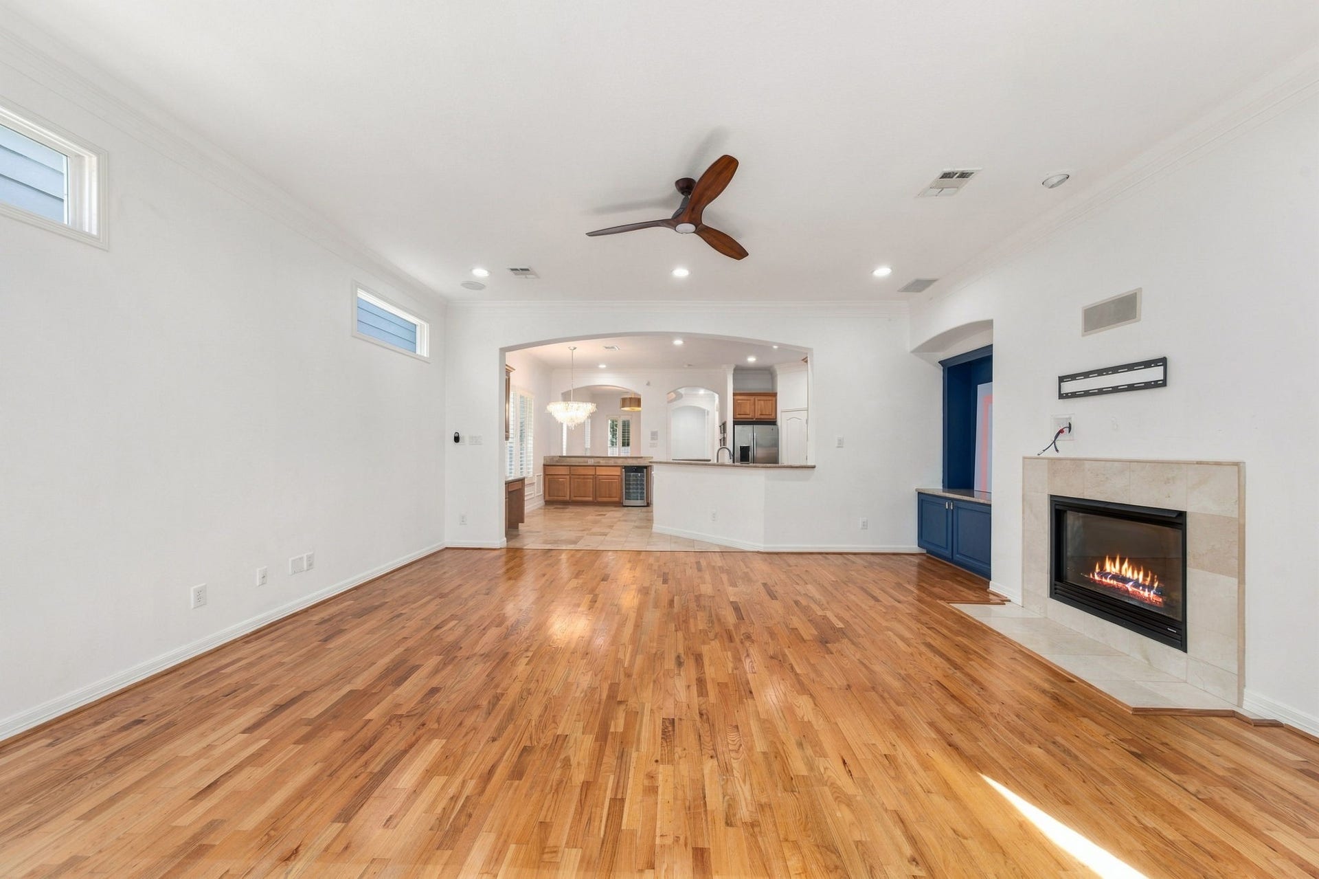 6113 Maxie Street, Houston, TX 77007 Looking back toward the kitchen and breakfast area, this view highlights the open layout and natural connection between the main living spaces.