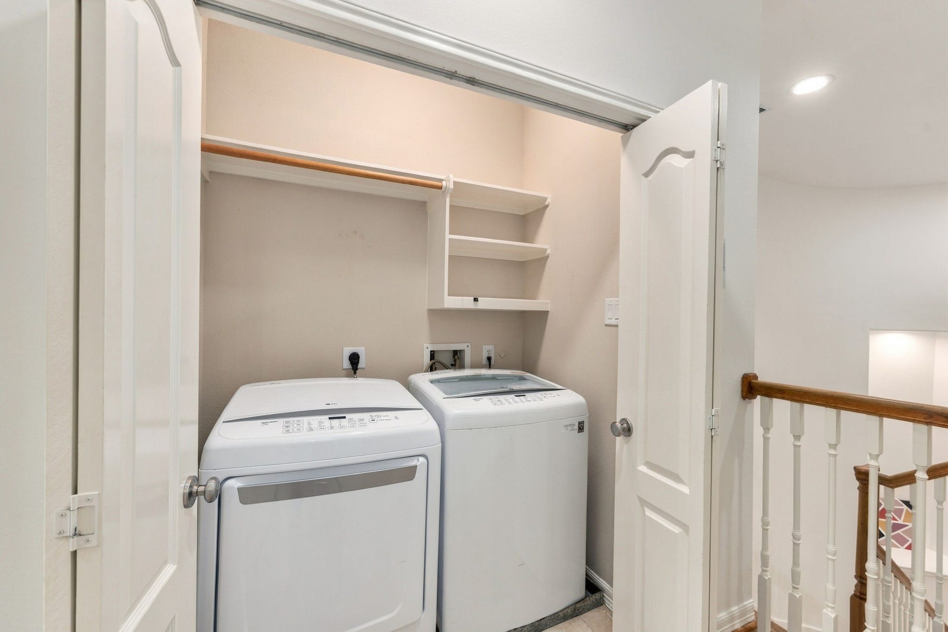 6113 Maxie Street, Houston, TX 77007 Conveniently located upstairs near all four bedrooms, the laundry area includes built-in shelving for additional storage.