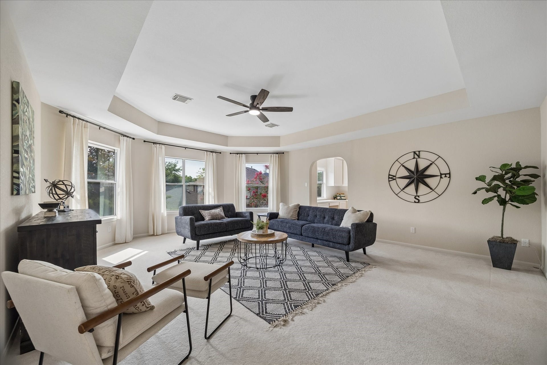 7503 Stone Arbor Drive, Sugar Land, TX 77479 A generous game room offers endless possibilities for movie nights, a playroom, or a second living area. Large windows and a tray ceiling make the space feel bright, open, and welcoming.