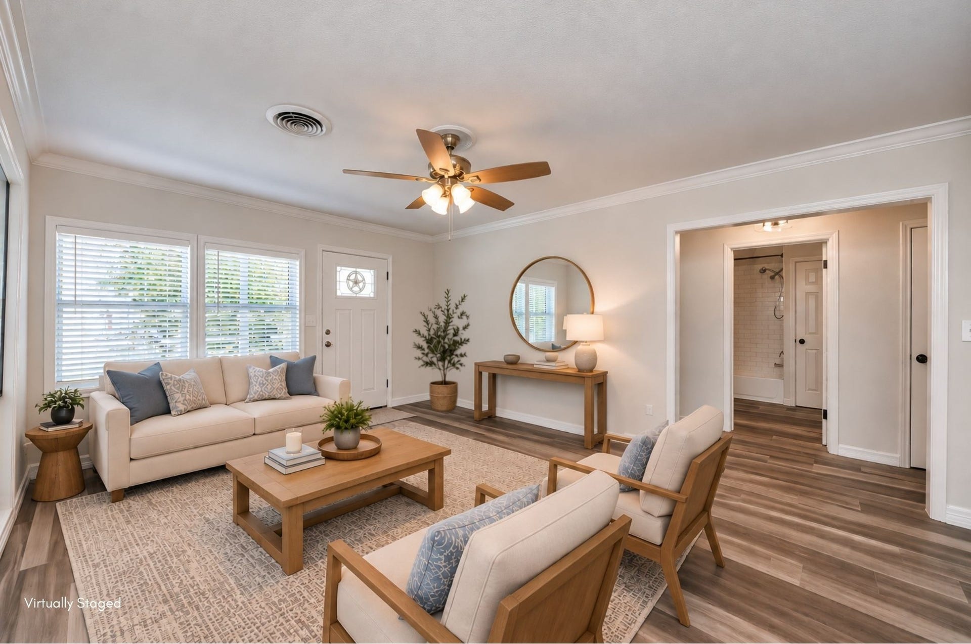 1309 W Lang Street, Alvin, TX 77511 Virtually staged living room to assist with visualizing furniture in the home.