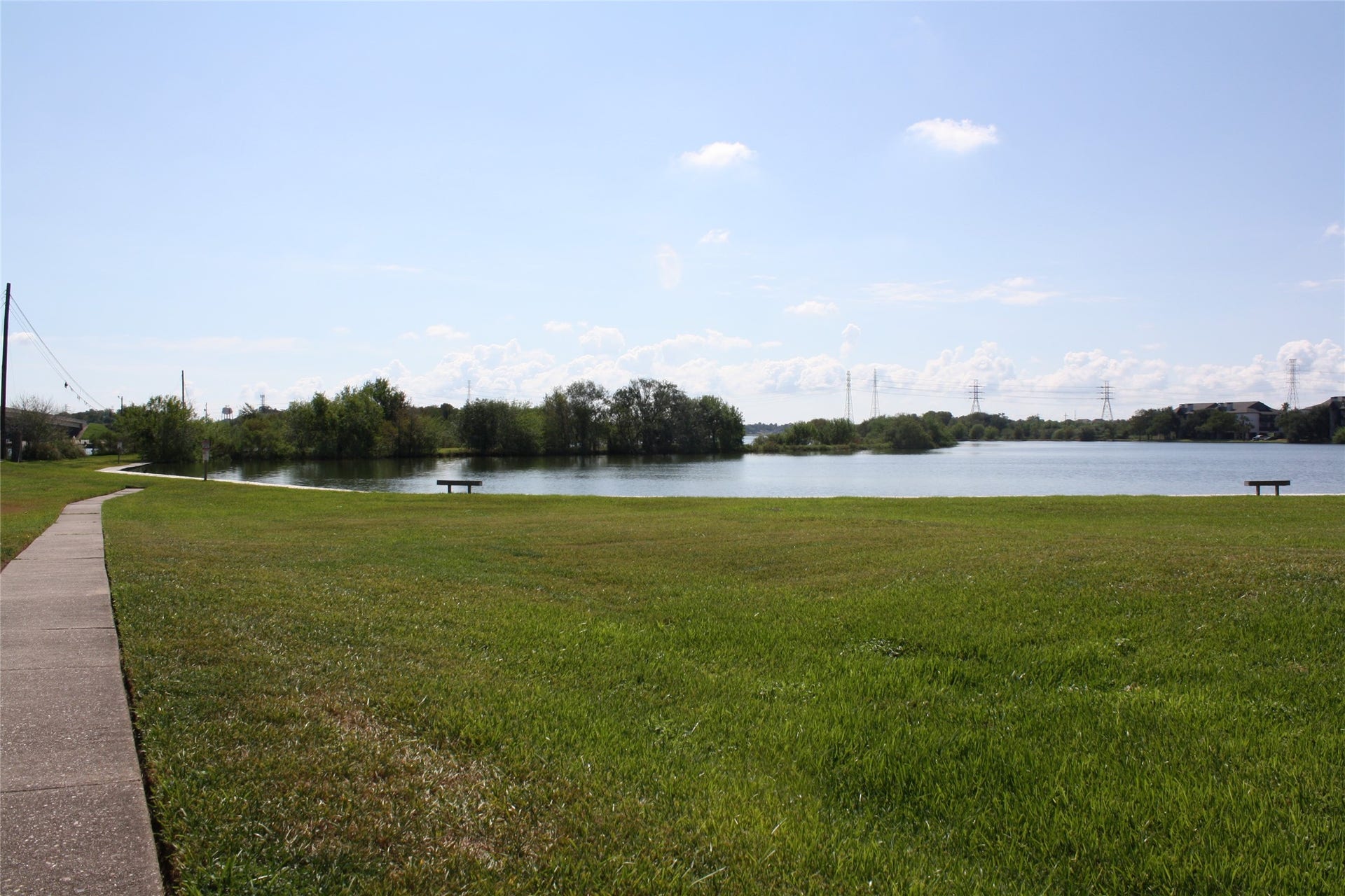 18800 Egret Bay Boulevard, #1101, Webster, TX 77058 Another view of Pearce Lake with places to rest and enjoy the scenery.