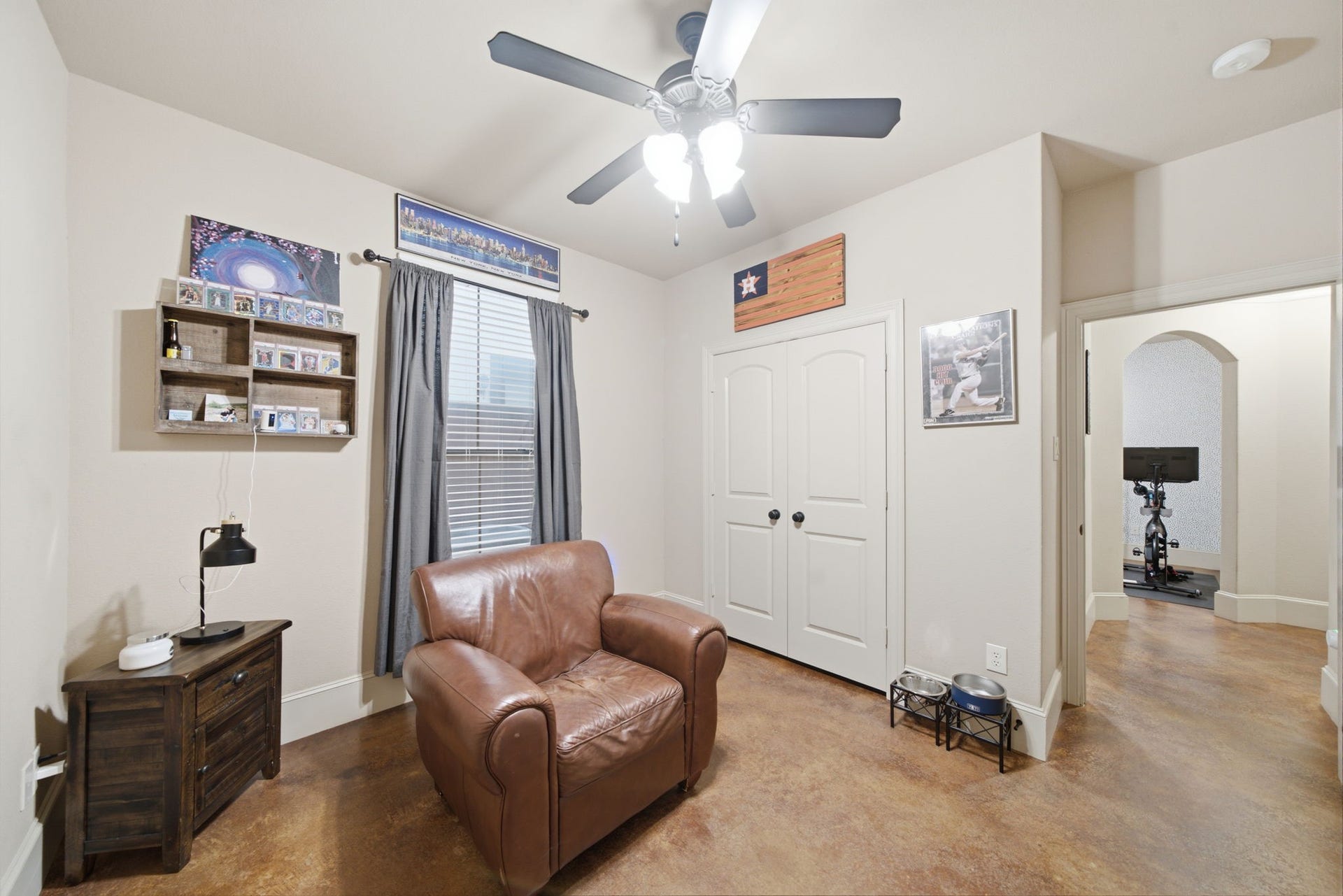 First floor bedroom/flex room with double door closet and full bathroom next door.