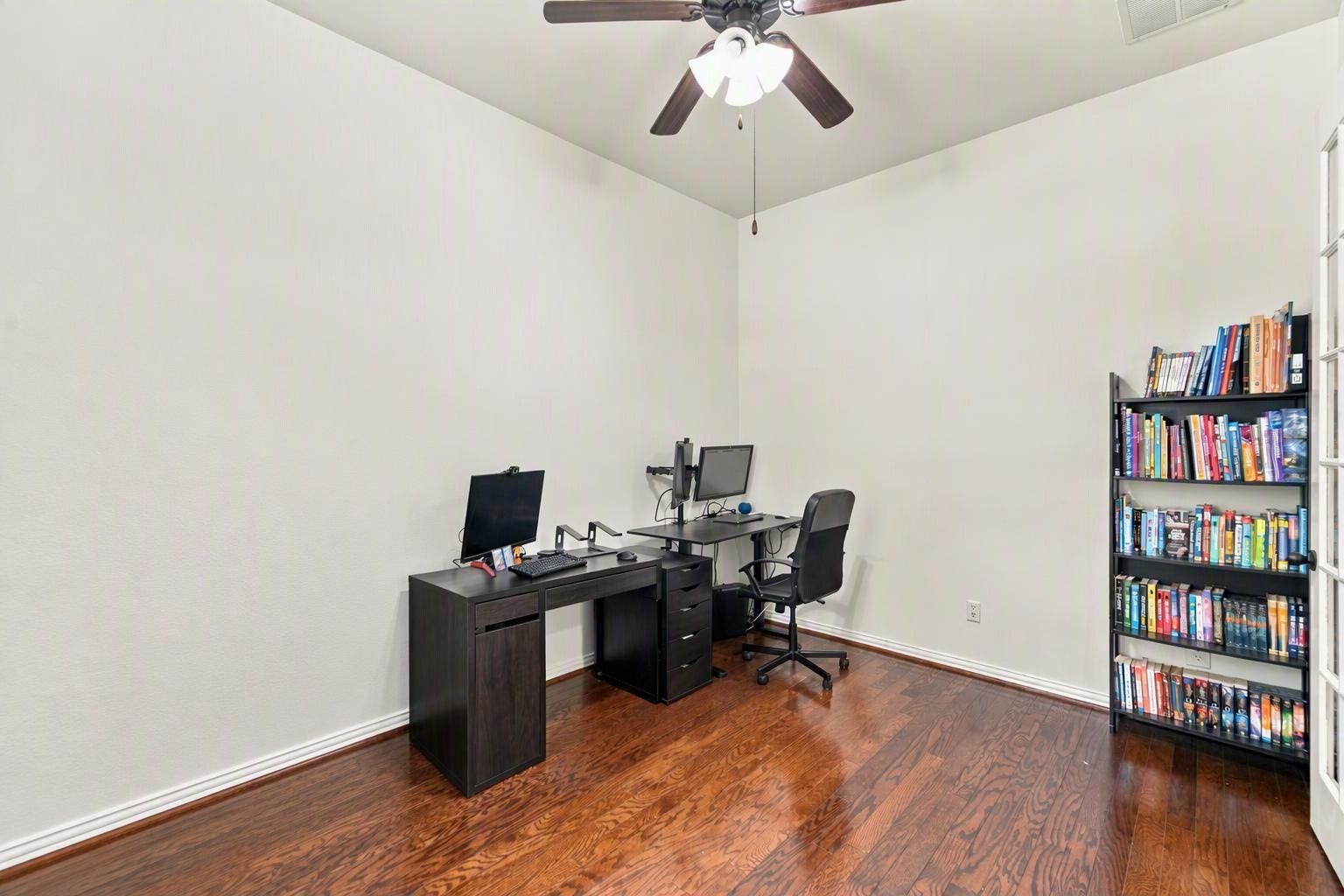 19011 Crest Cove Drive, Cypress, TX 77433 Another view of the spacious home office. Edited using AI tools.