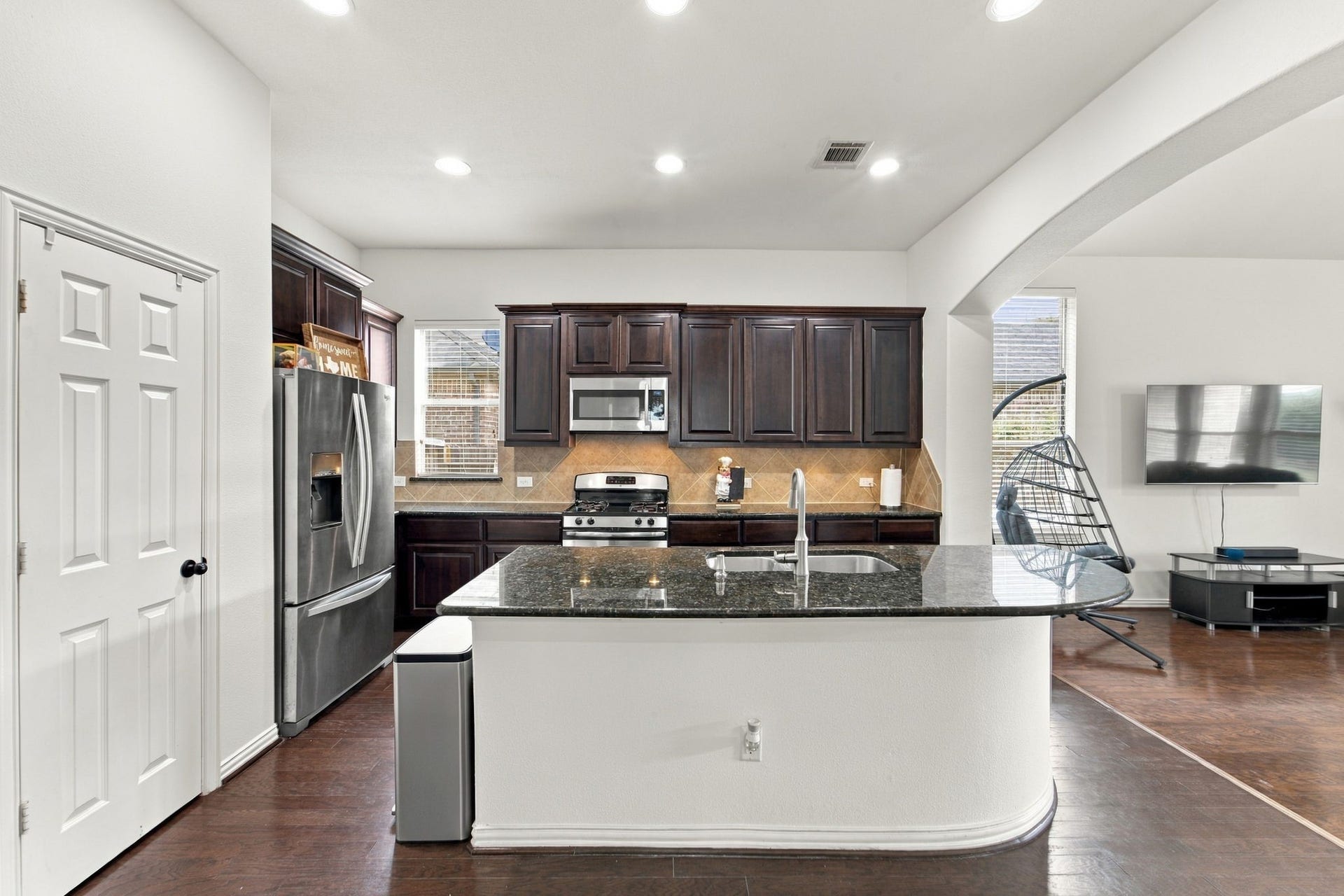19011 Crest Cove Drive, Cypress, TX 77433 Cooking feels effortless in this bright kitchen, with stainless appliances, a gas range, and plenty of cabinet storage. Recent updates like the new dishwasher and faucet make it practical for daily life.