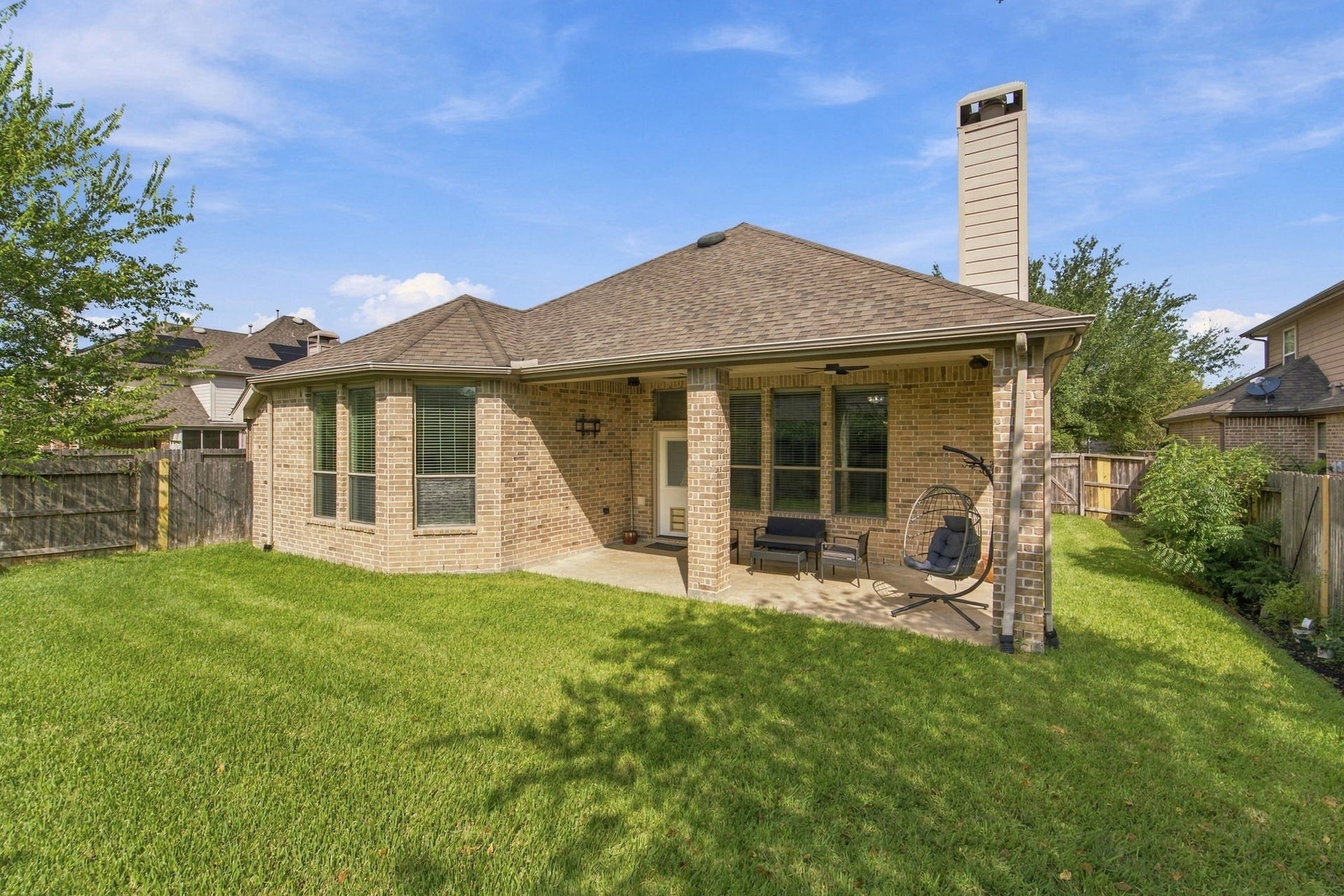 19011 Crest Cove Drive, Cypress, TX 77433 The extended covered patio with two ceiling fans is made for outdoor living, from morning coffee to weekend cookouts. The fenced backyard gives you green space to enjoy, with room to play and relax.