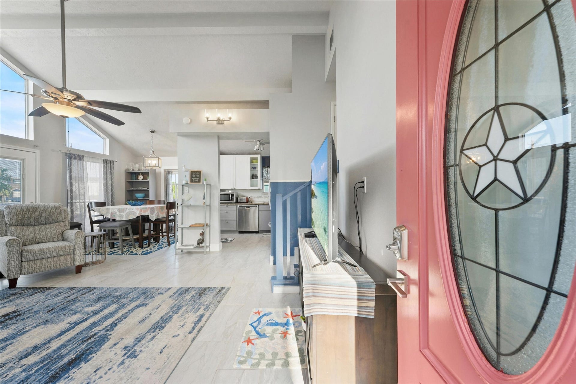 22513 Bay Point Drive, Galveston, TX 77554 Upon entering are high ceilings, natural lighting, and beautiful floors.