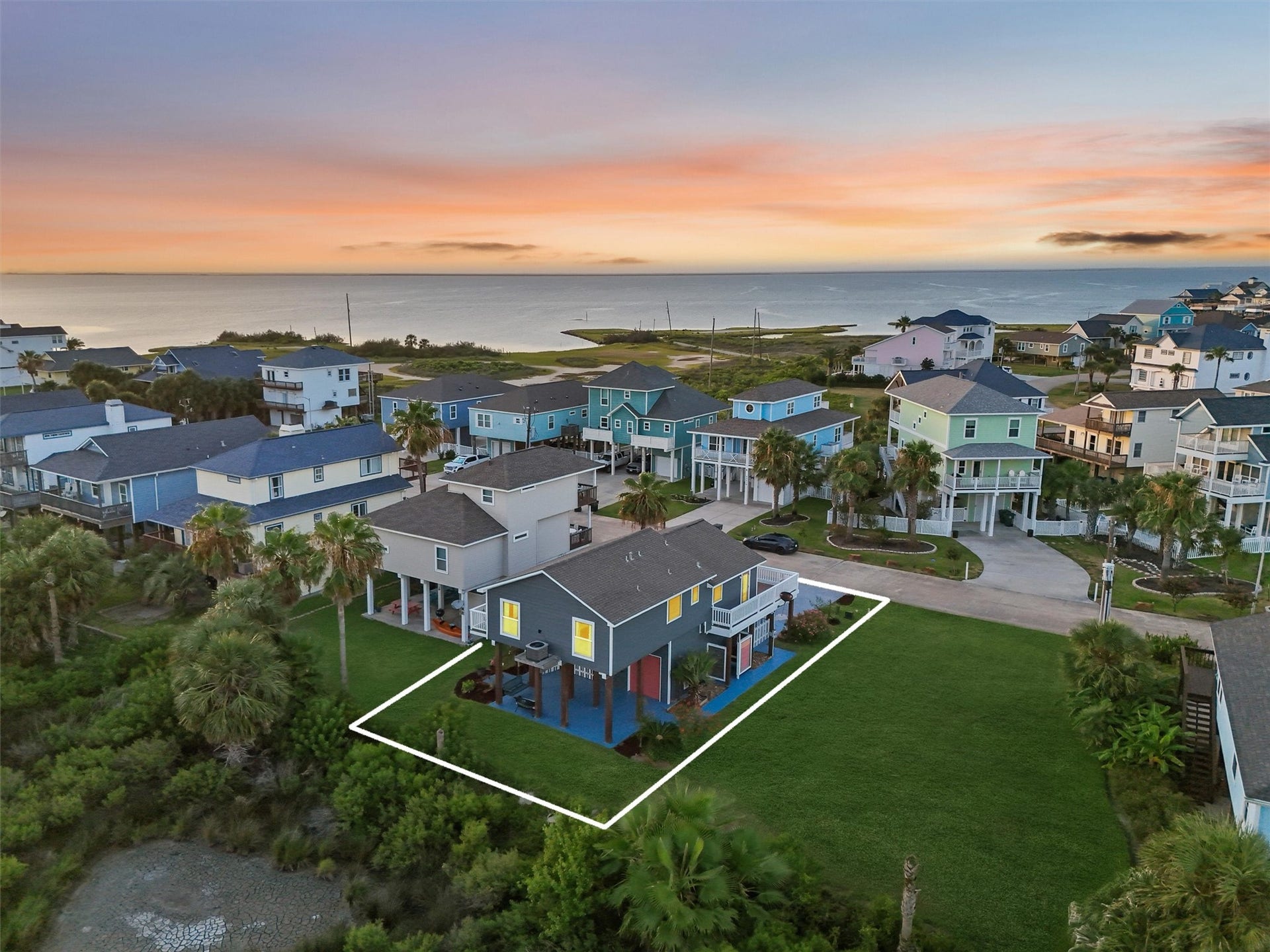 22513 Bay Point Drive, Galveston, TX 77554 This home has plenty of green space.