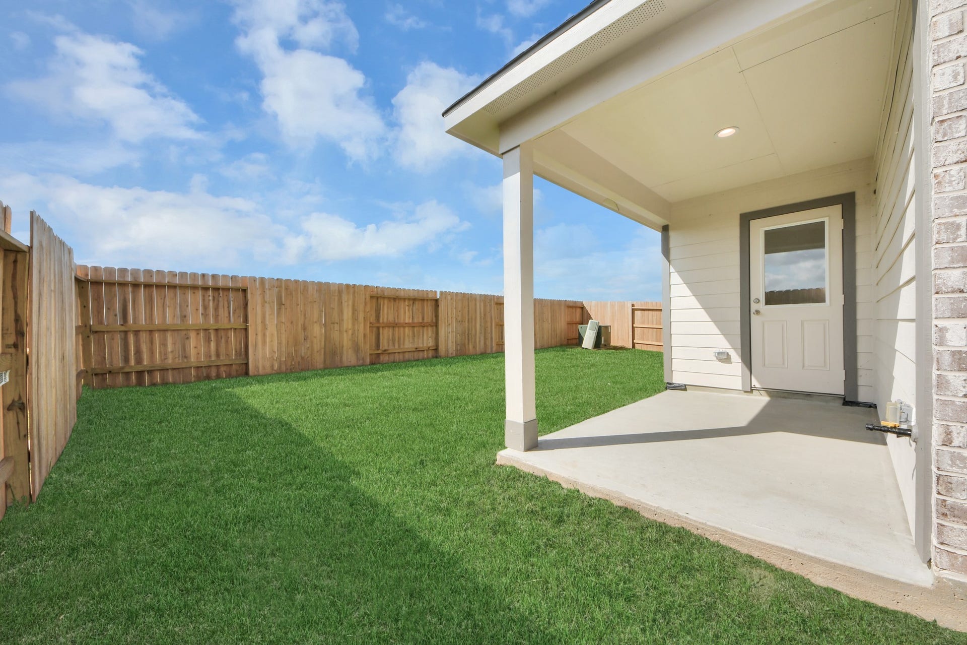 5830 Madison Trail Drive, Richmond, TX 77469 Come and see this spacious backyard with its beautiful covered patio. There is plenty of room for the kids to play and adults to relax. Perfect for your outdoor living space, patio furniture, bbq pit, and so much more. The possibilities are endless! Sample photo of completed home with similar floor plan. Actual colors and selections may vary.