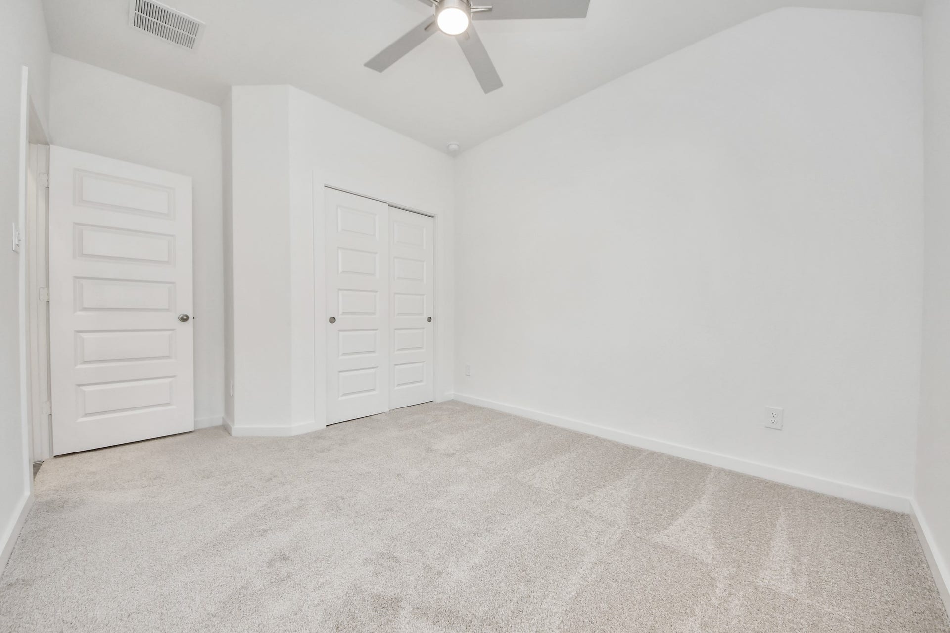 5830 Madison Trail Drive, Richmond, TX 77469 Generously sized secondary bedrooms featuring spacious closets, soft and inviting carpeting underfoot, large windows allowing plenty of natural light, and the added touch of privacy blinds for your personal retreat. Sample photo of completed home with similar floor plan. Actual colors and selections may vary.