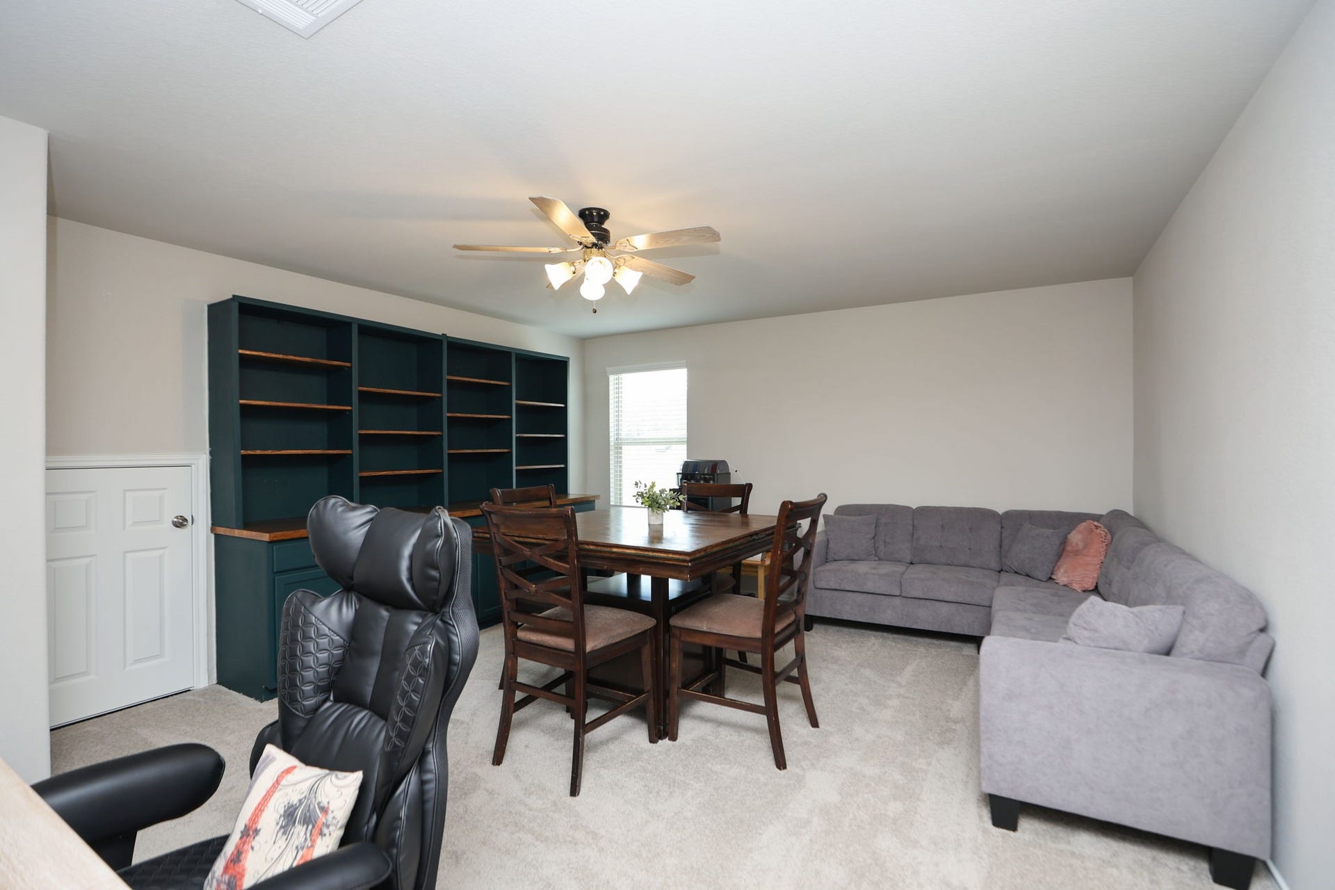 25499 Blue Mistflower Drive, Montgomery, TX 77316 Up stairs game room with built in shelving