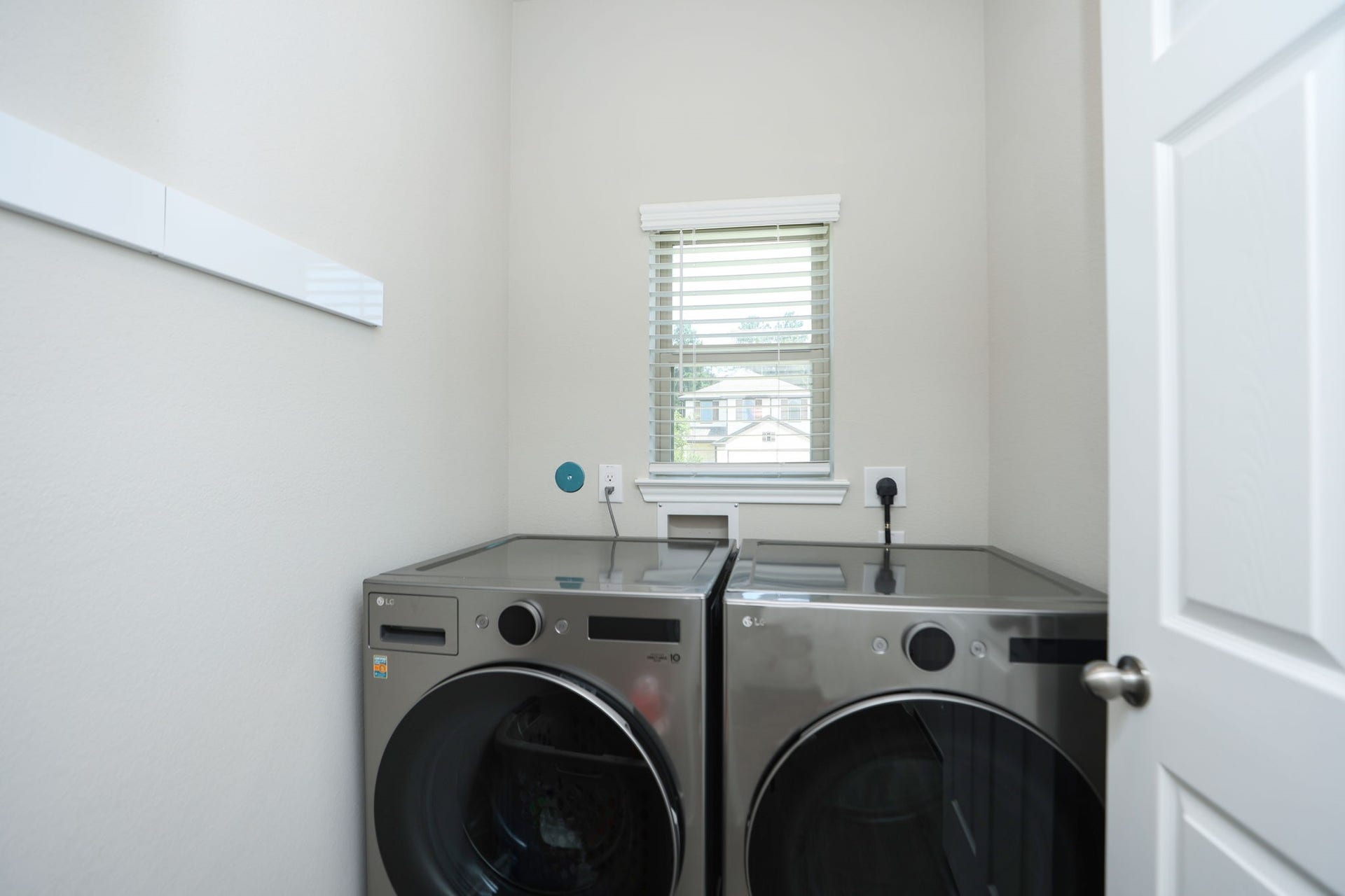 25499 Blue Mistflower Drive, Montgomery, TX 77316 1st floor laundry room