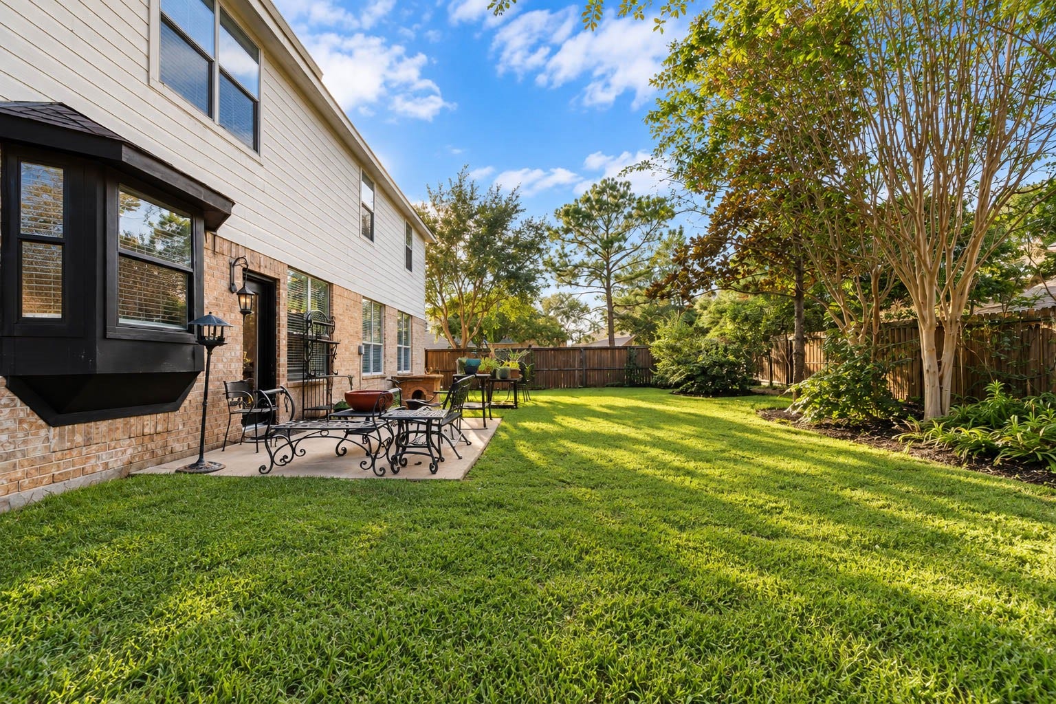 25734 Jewel Springs Lane, Katy, TX 77494 Notice the distinctive bay window and beautifully maintained backyard.