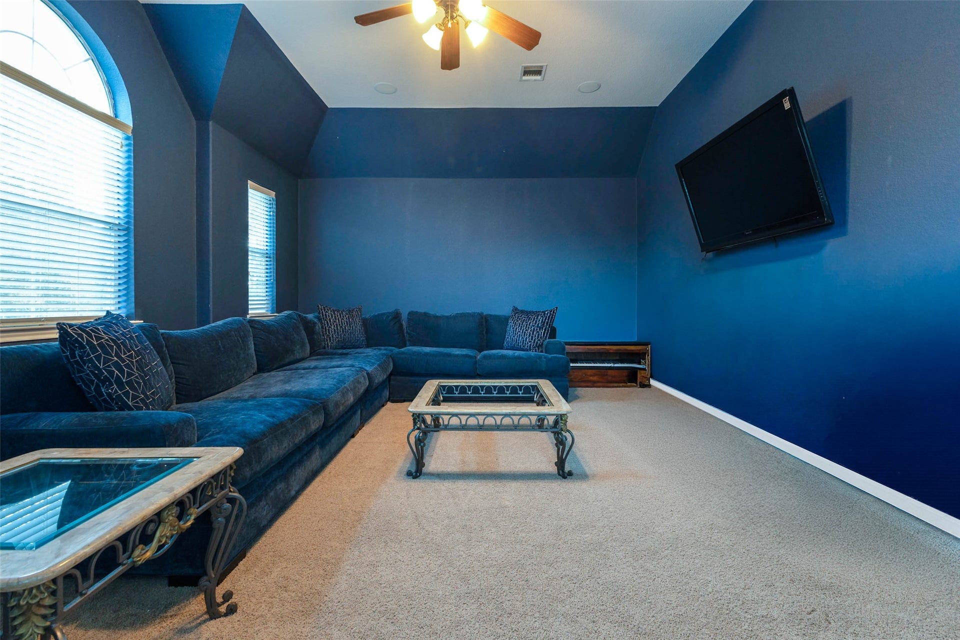 25734 Jewel Springs Lane, Katy, TX 77494 This upstairs entertainment room an ideal destination for movies or hosting game nights.