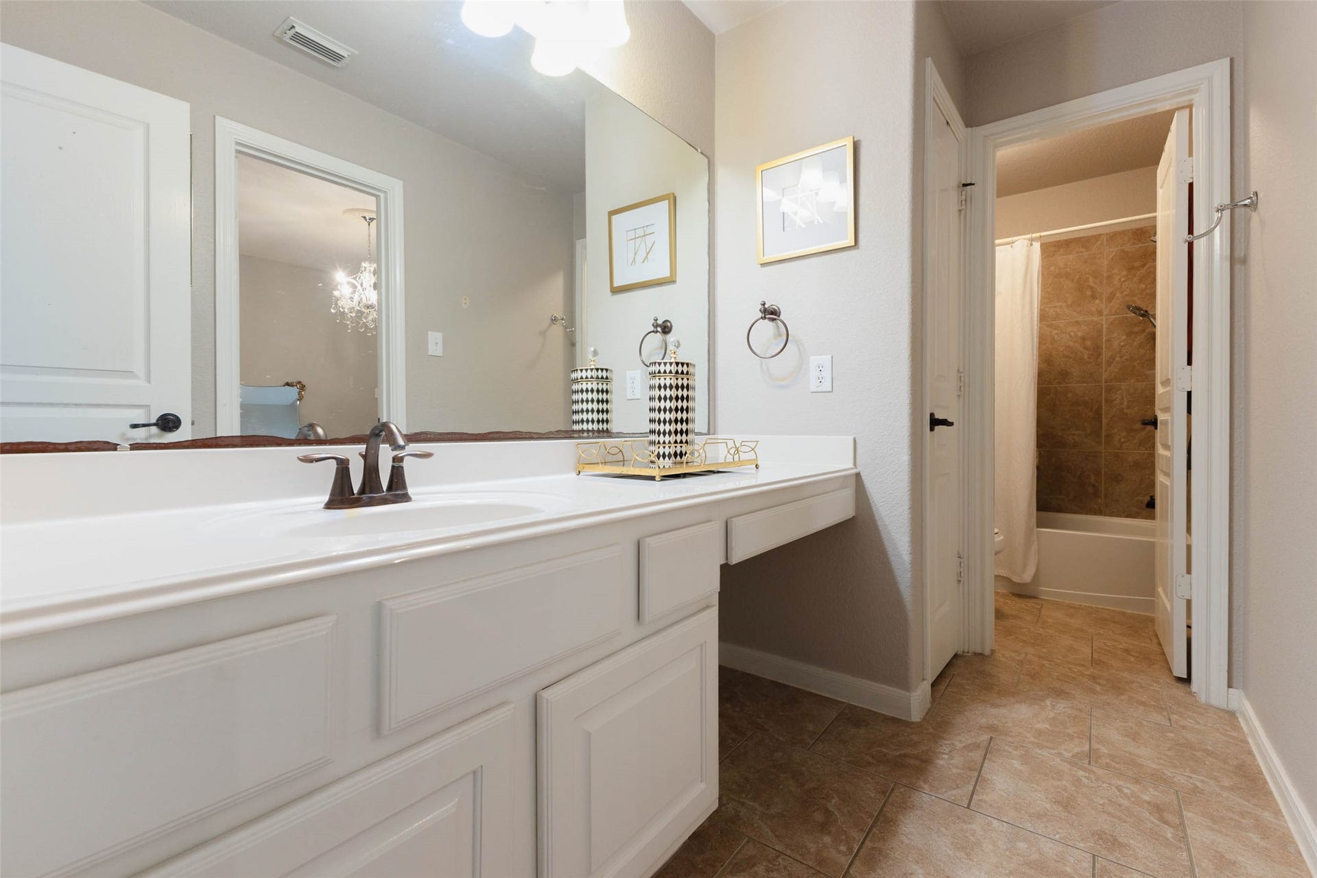 25734 Jewel Springs Lane, Katy, TX 77494 An extended vanity countertop in this secondary bathroom.