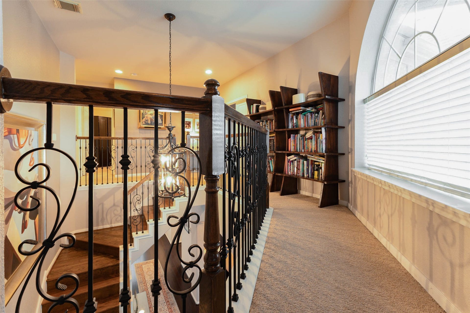 25734 Jewel Springs Lane, Katy, TX 77494 Elegant detailing lead to the game room through this upper-level landing.